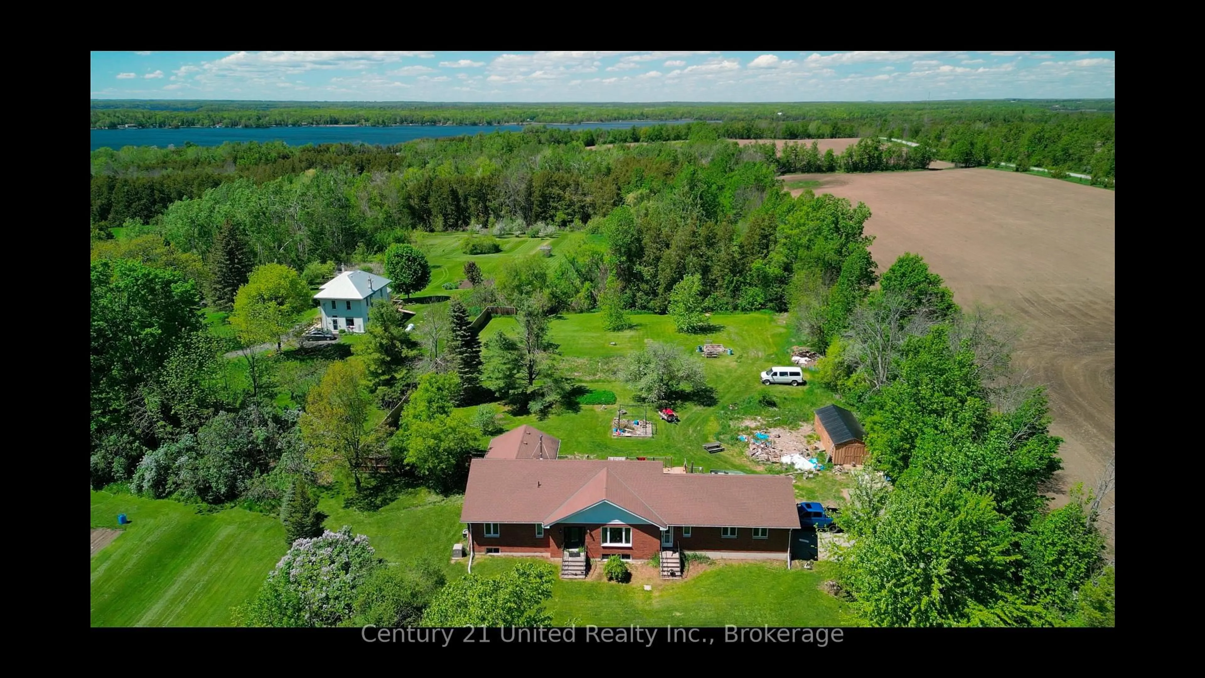 A pic from outside/outdoor area/front of a property/back of a property/a pic from drone, water/lake/river/ocean view for 1592 12th Line Smith, Selwyn Ontario K0L 2H0