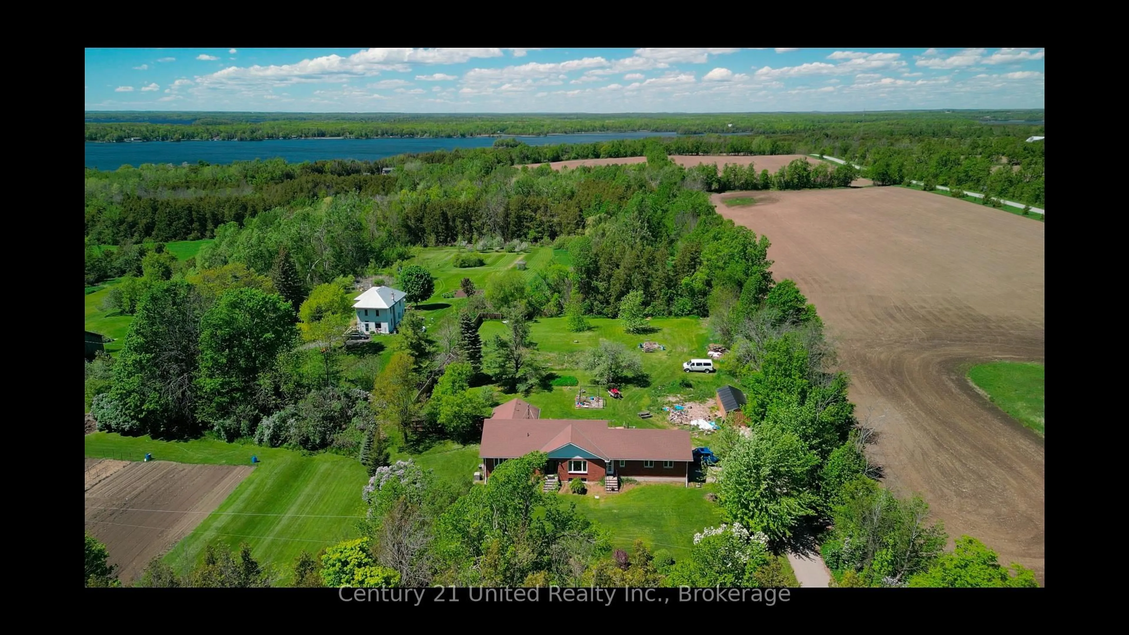 A pic from outside/outdoor area/front of a property/back of a property/a pic from drone, water/lake/river/ocean view for 1592 12th Line Smith, Selwyn Ontario K0L 2H0