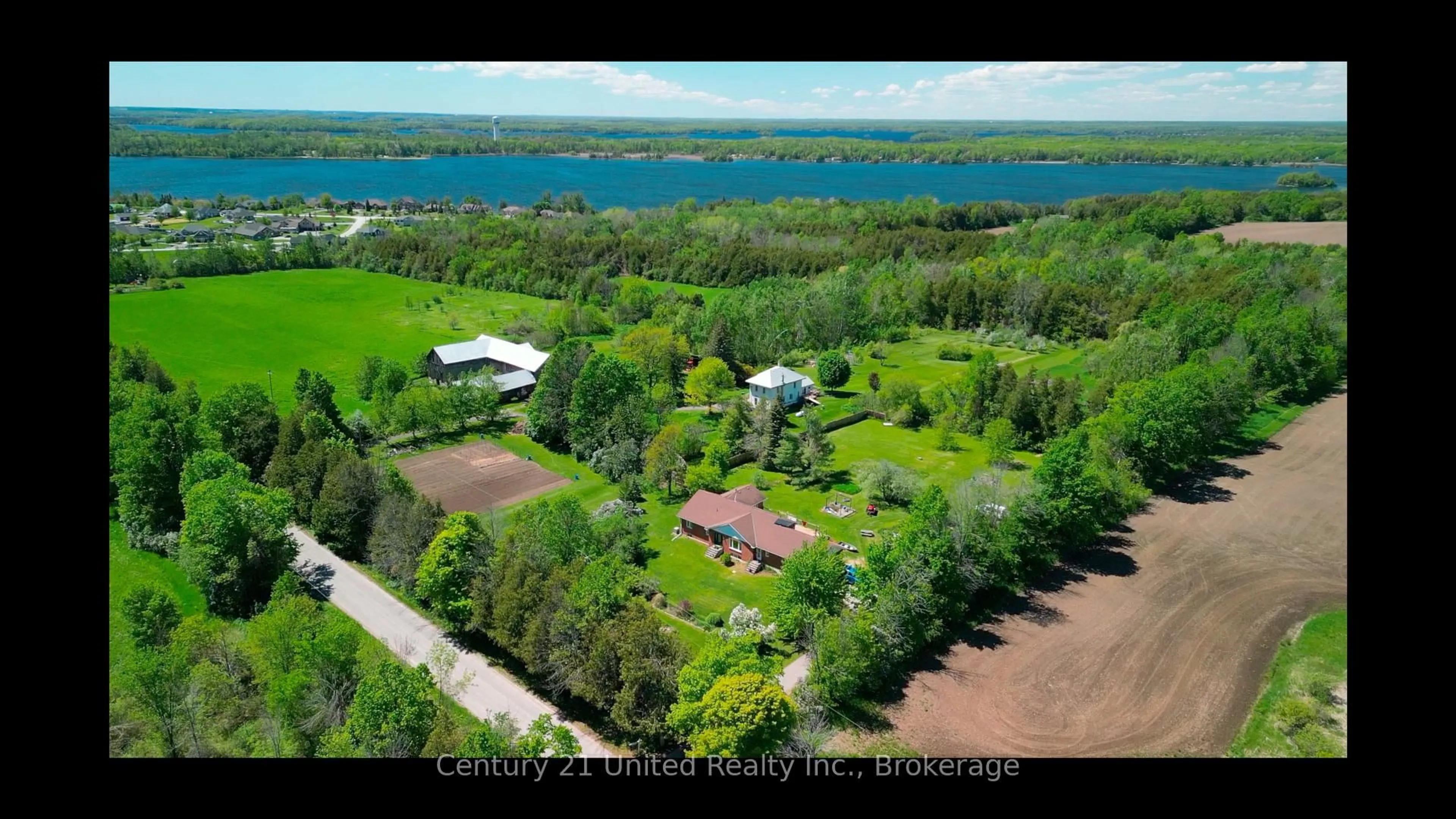 A pic from outside/outdoor area/front of a property/back of a property/a pic from drone, water/lake/river/ocean view for 1592 12th Line Smith, Selwyn Ontario K0L 2H0