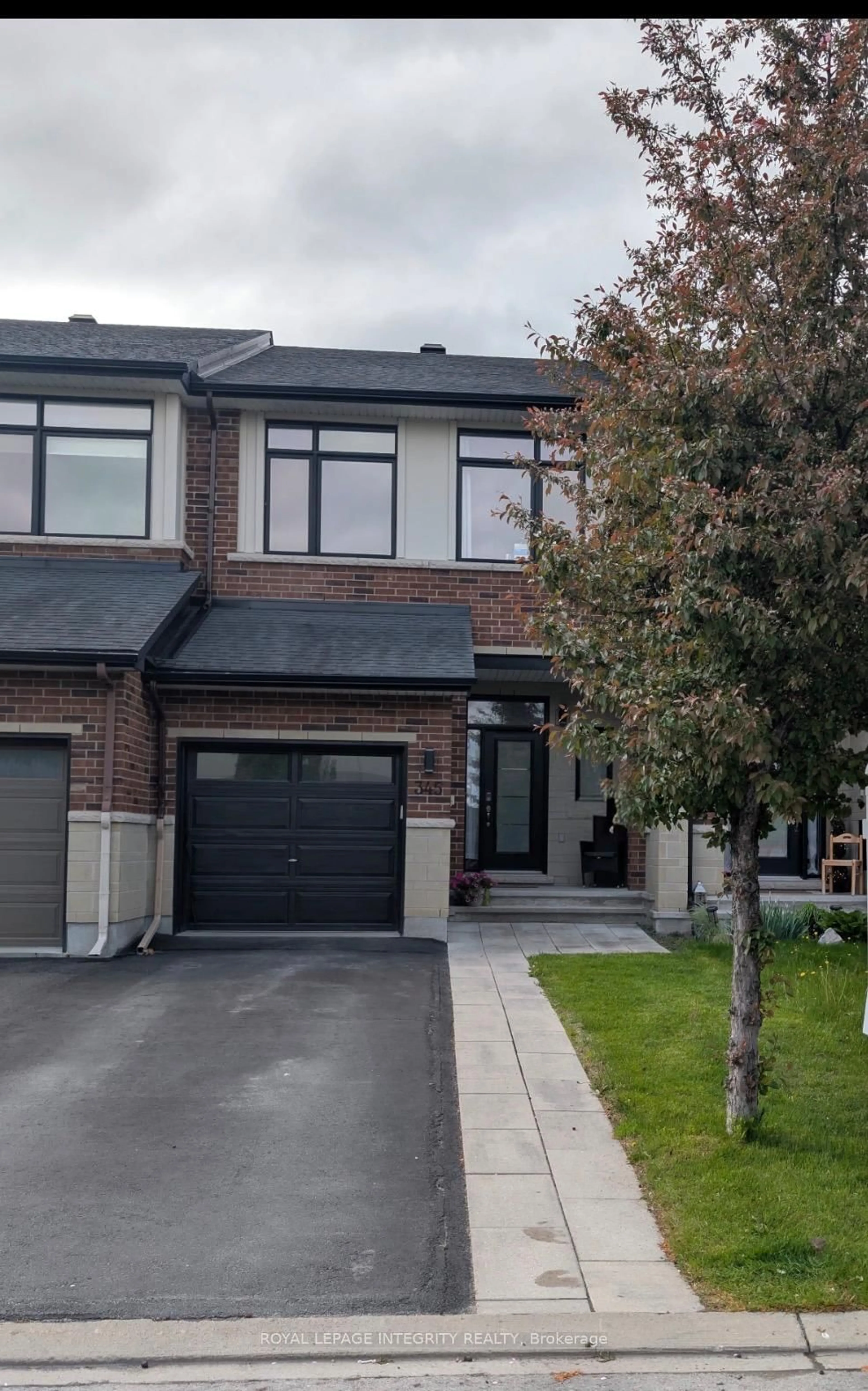 Home with brick exterior material, street for 345 Cooks Mill Cres, Ottawa Ontario K1V 2N3