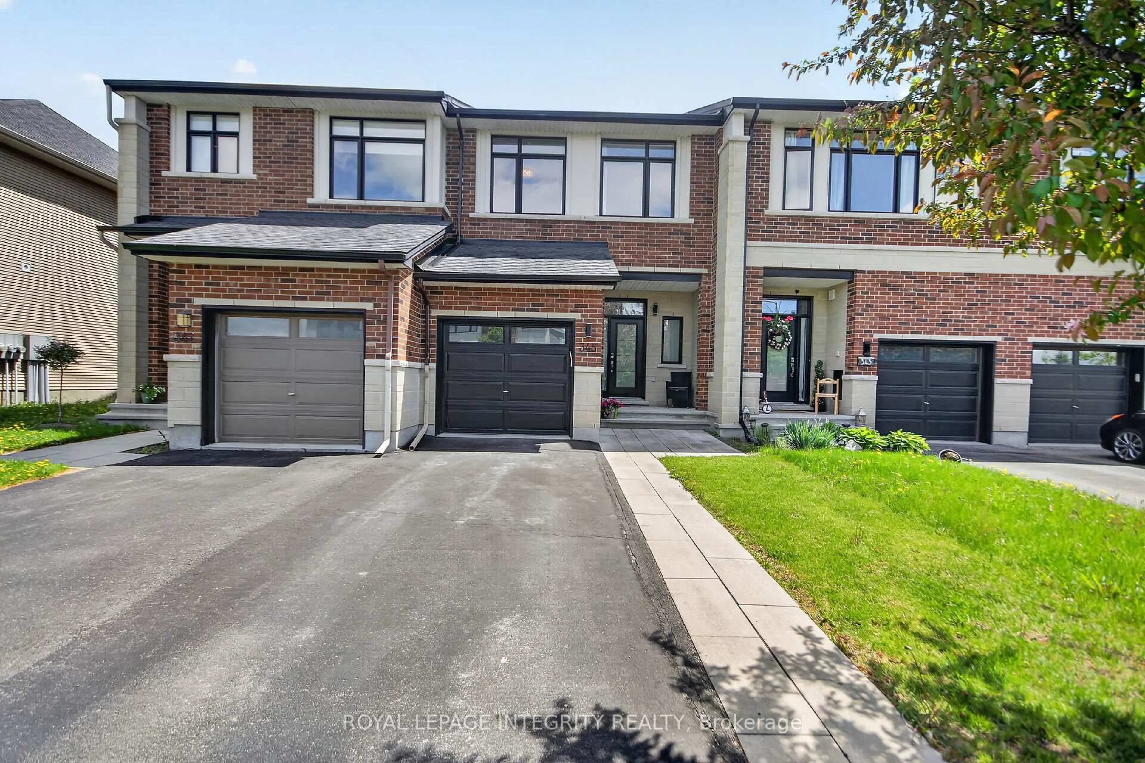 Home with brick exterior material, street for 345 Cooks Mill Cres, Ottawa Ontario K1V 2N3