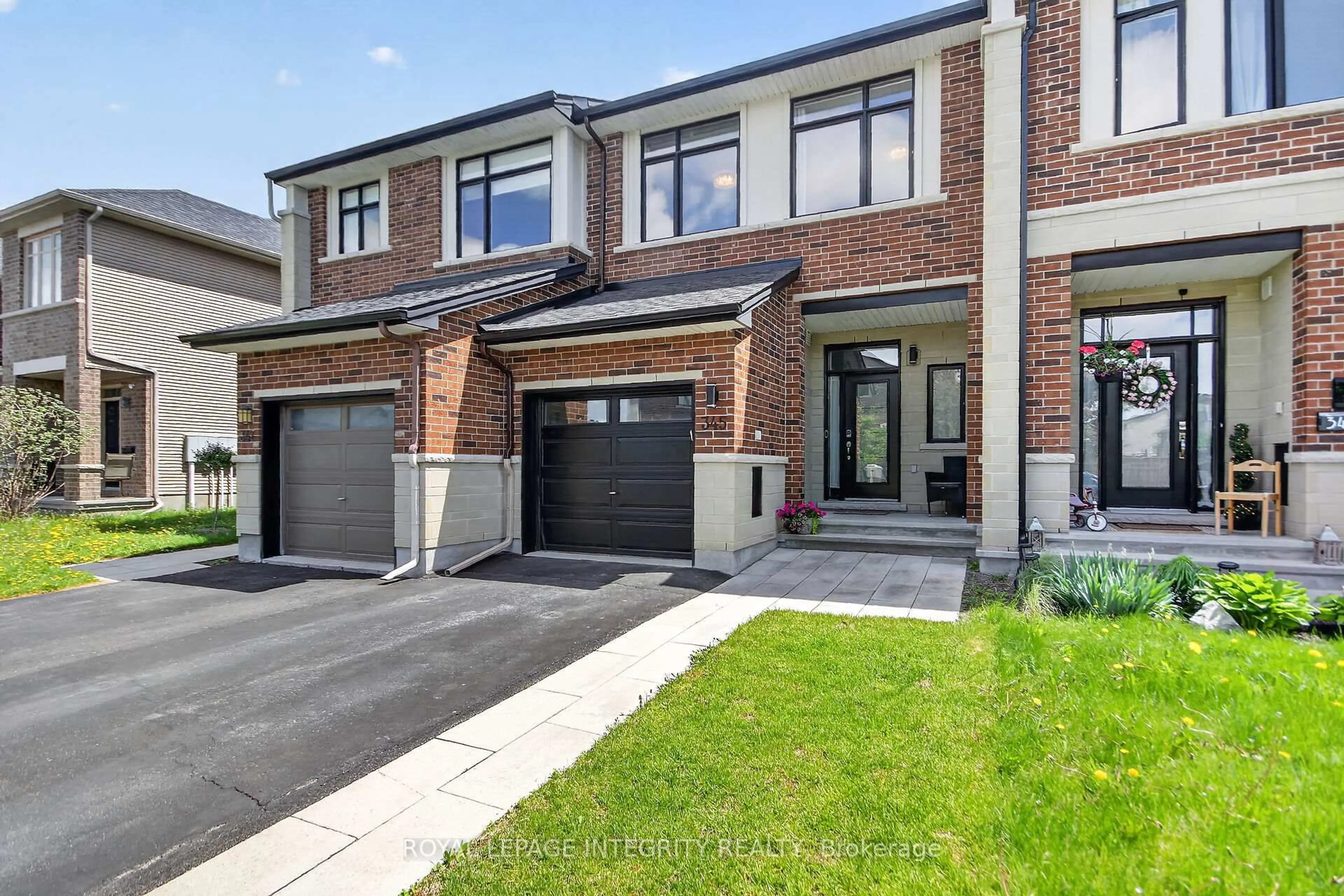 Home with brick exterior material, street for 345 Cooks Mill Cres, Ottawa Ontario K1V 2N3