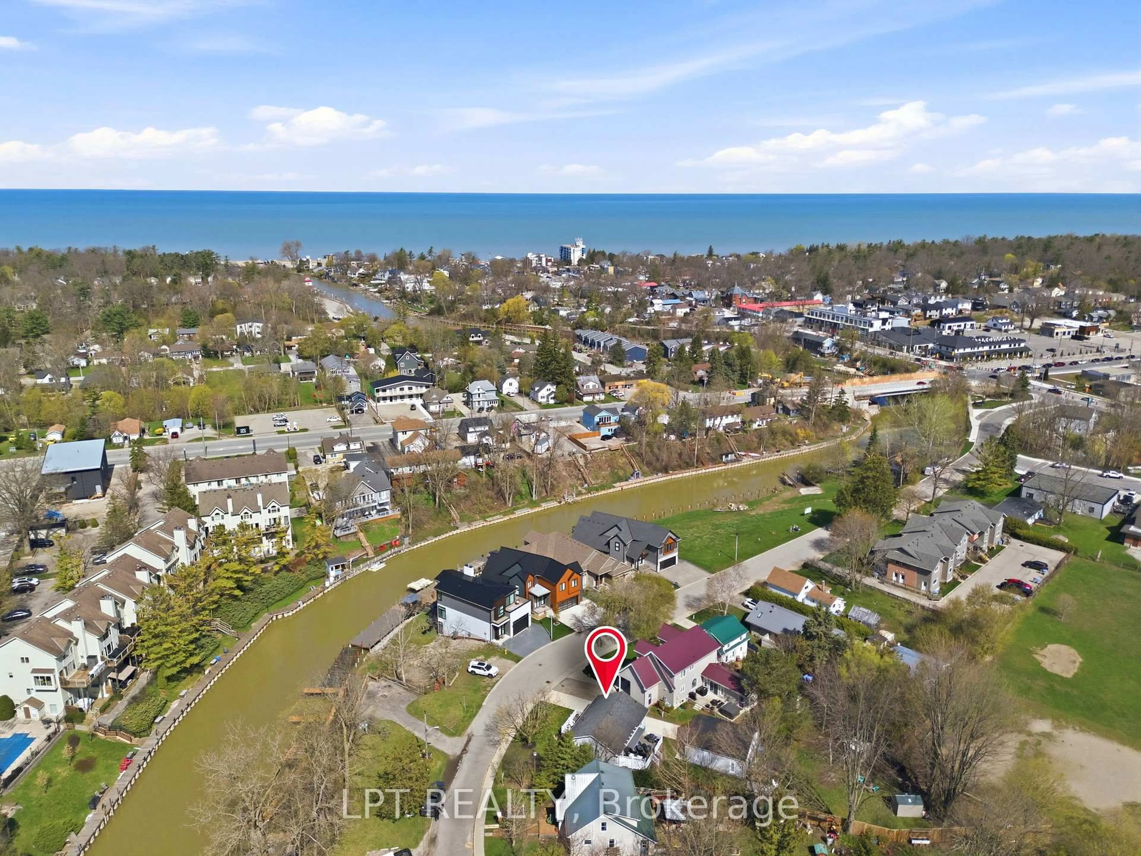 A pic from outside/outdoor area/front of a property/back of a property/a pic from drone, water/lake/river/ocean view for 30 Sauble River Rd, Lambton Shores Ontario N0M 1T0