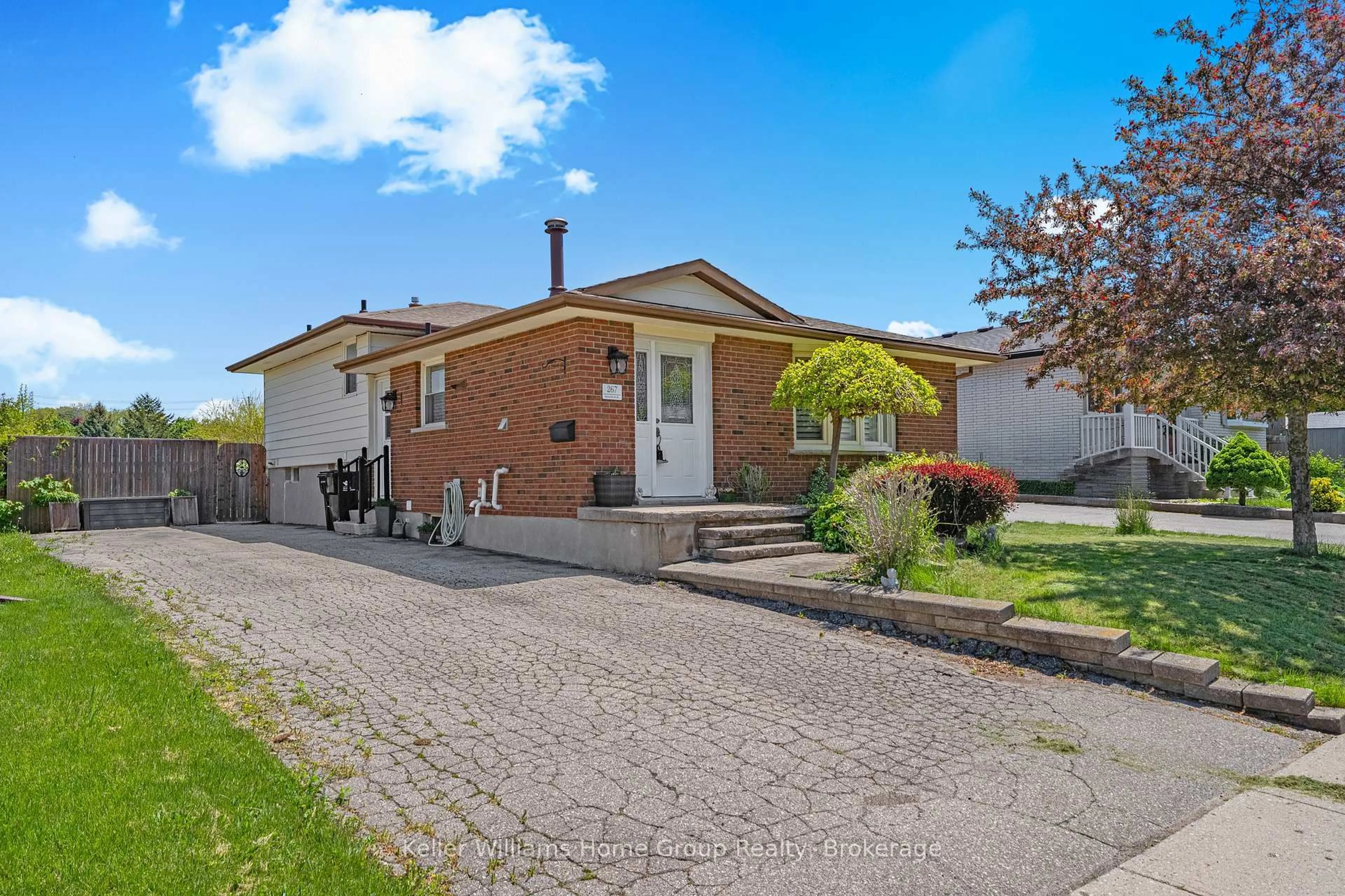 Home with brick exterior material, street for 267 Bakersfield Dr, Cambridge Ontario N1R 6X9