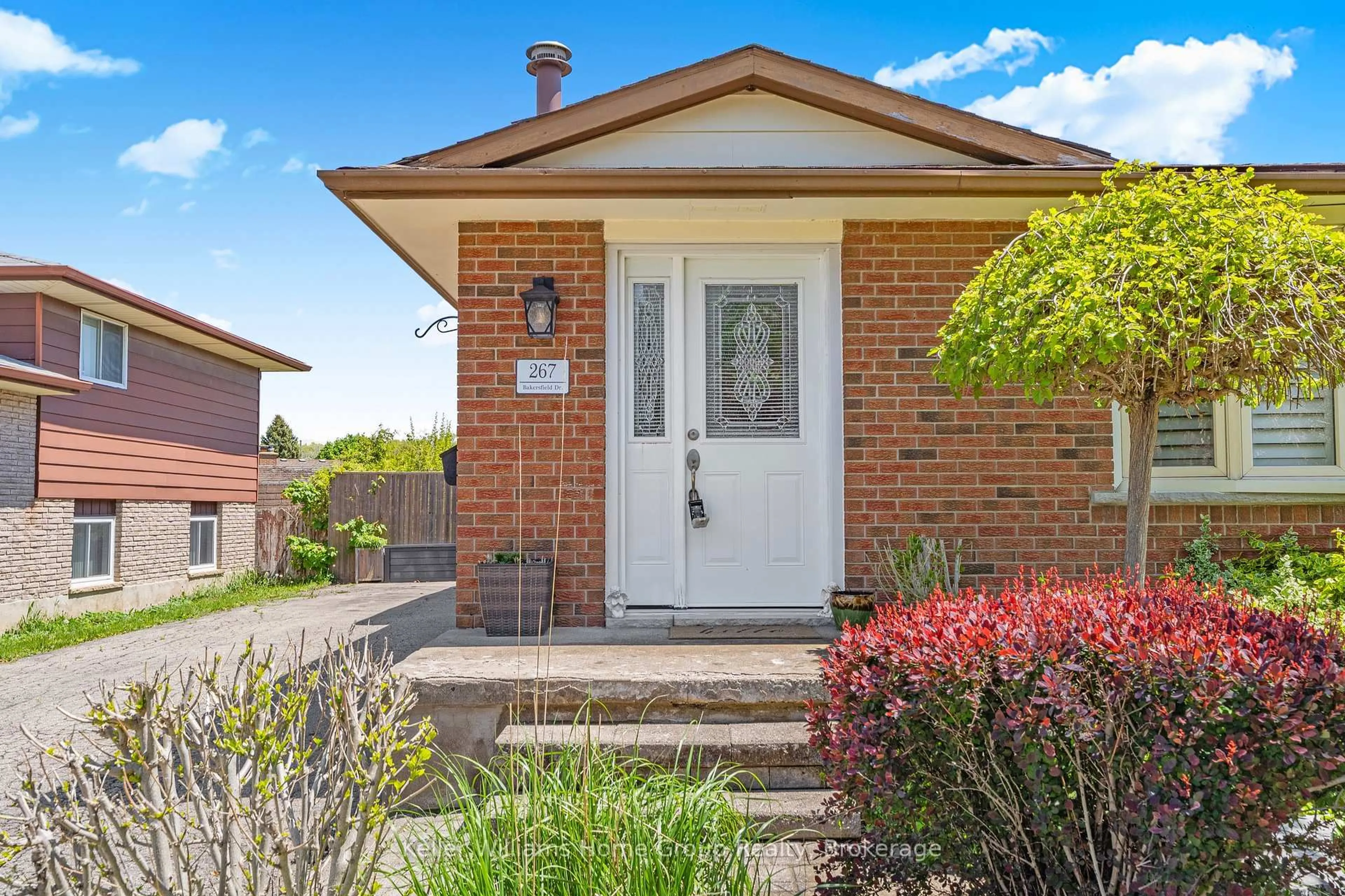 Home with brick exterior material, street for 267 Bakersfield Dr, Cambridge Ontario N1R 6X9