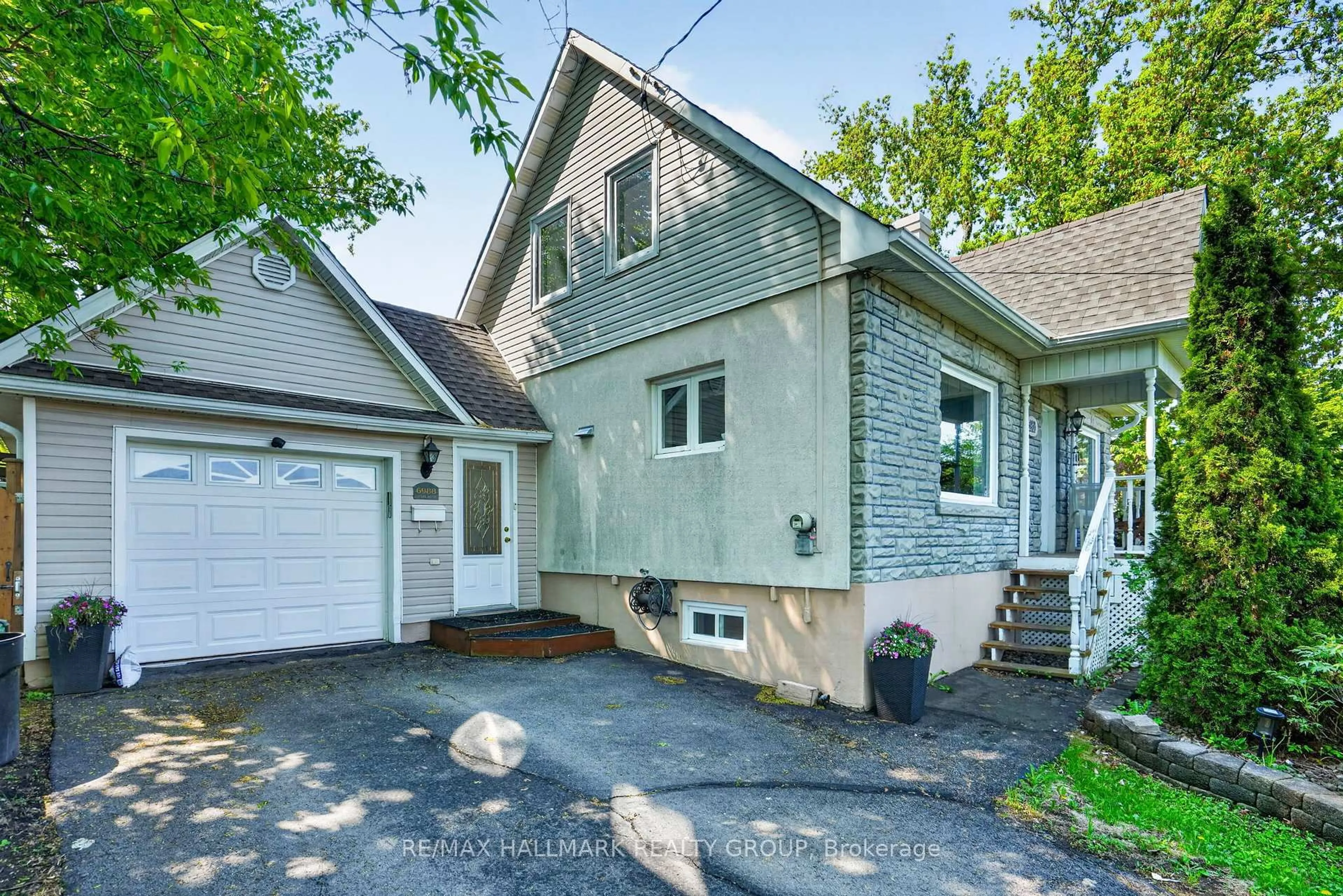 Home with vinyl exterior material, street for 6988 Notre Dame St, Ottawa Ontario K1C 1H7