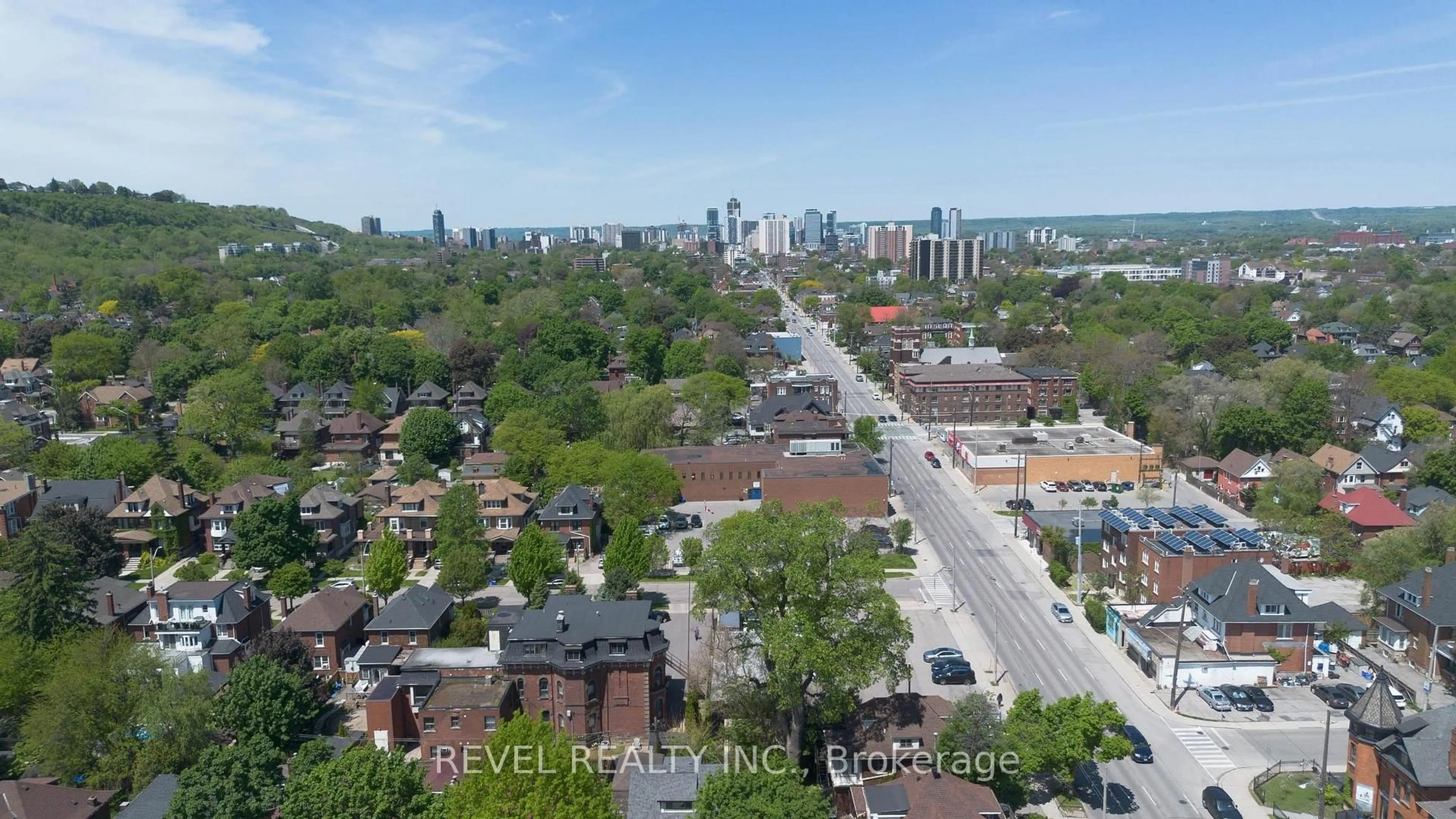 A pic from outside/outdoor area/front of a property/back of a property/a pic from drone, city buildings view from balcony for 822 Main St, Hamilton Ontario L8M 1L6