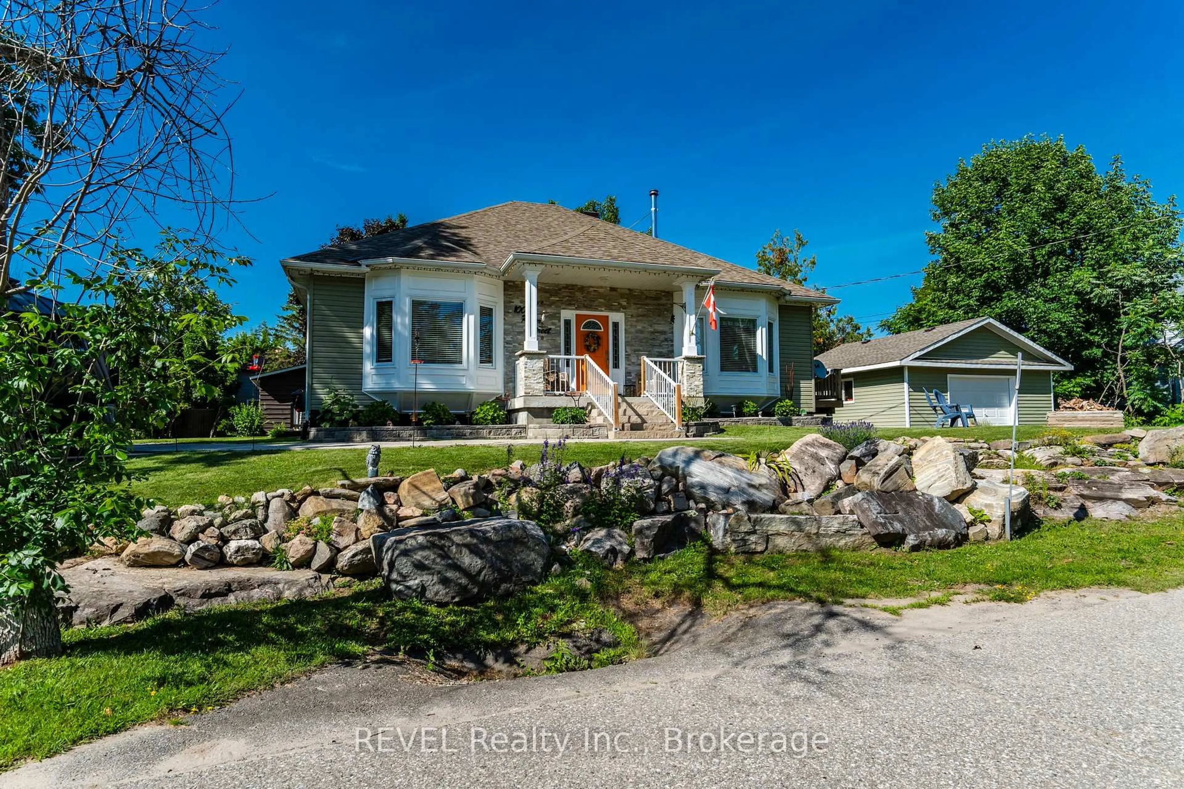 A pic from outside/outdoor area/front of a property/back of a property/a pic from drone, street for 1006 River St, Muskoka Lakes Ontario P0C 1A0