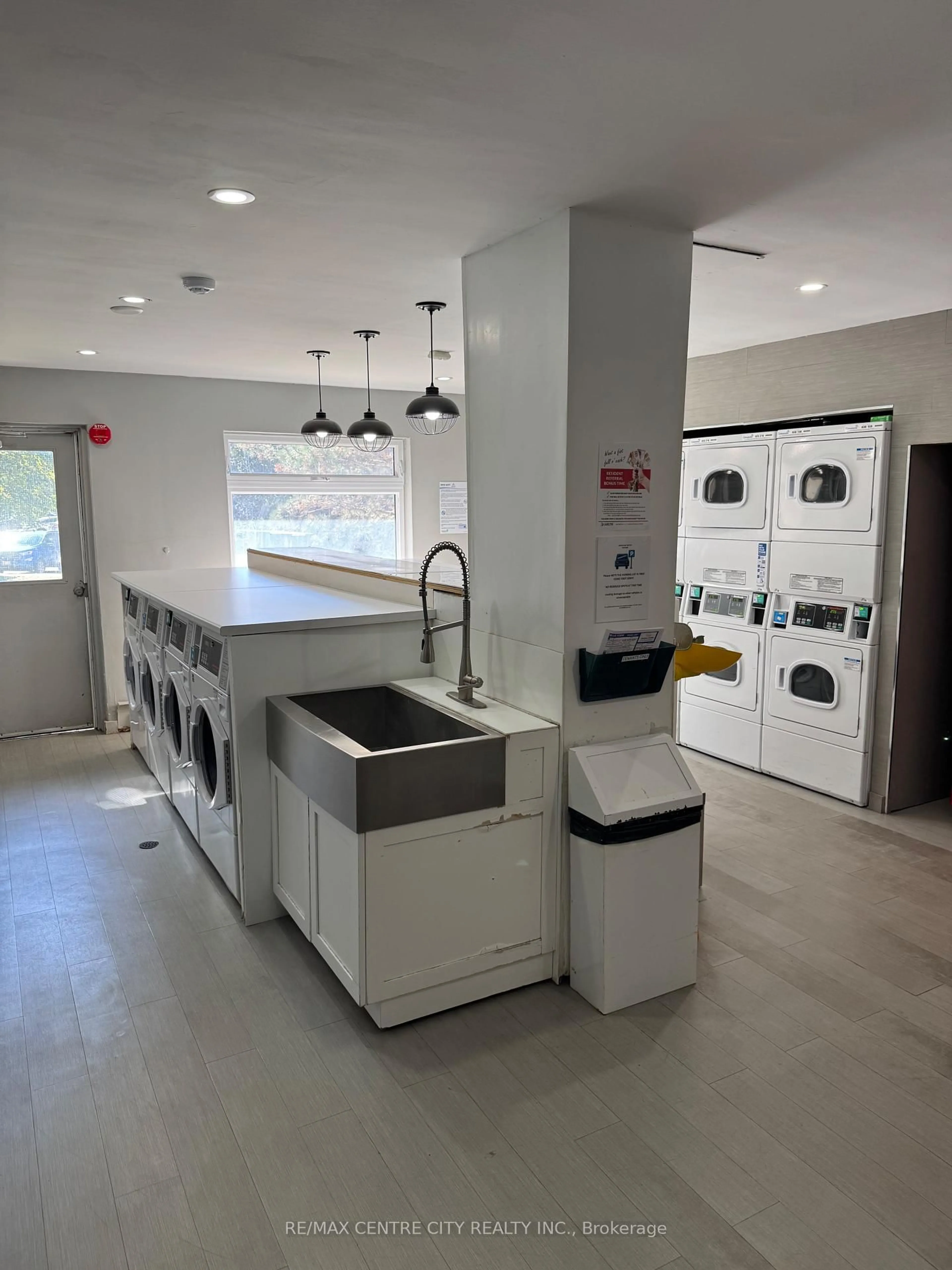 Kitchen with laundary machines, unknown for 563 Mornington Ave #407, London East Ontario N5Y 4T8