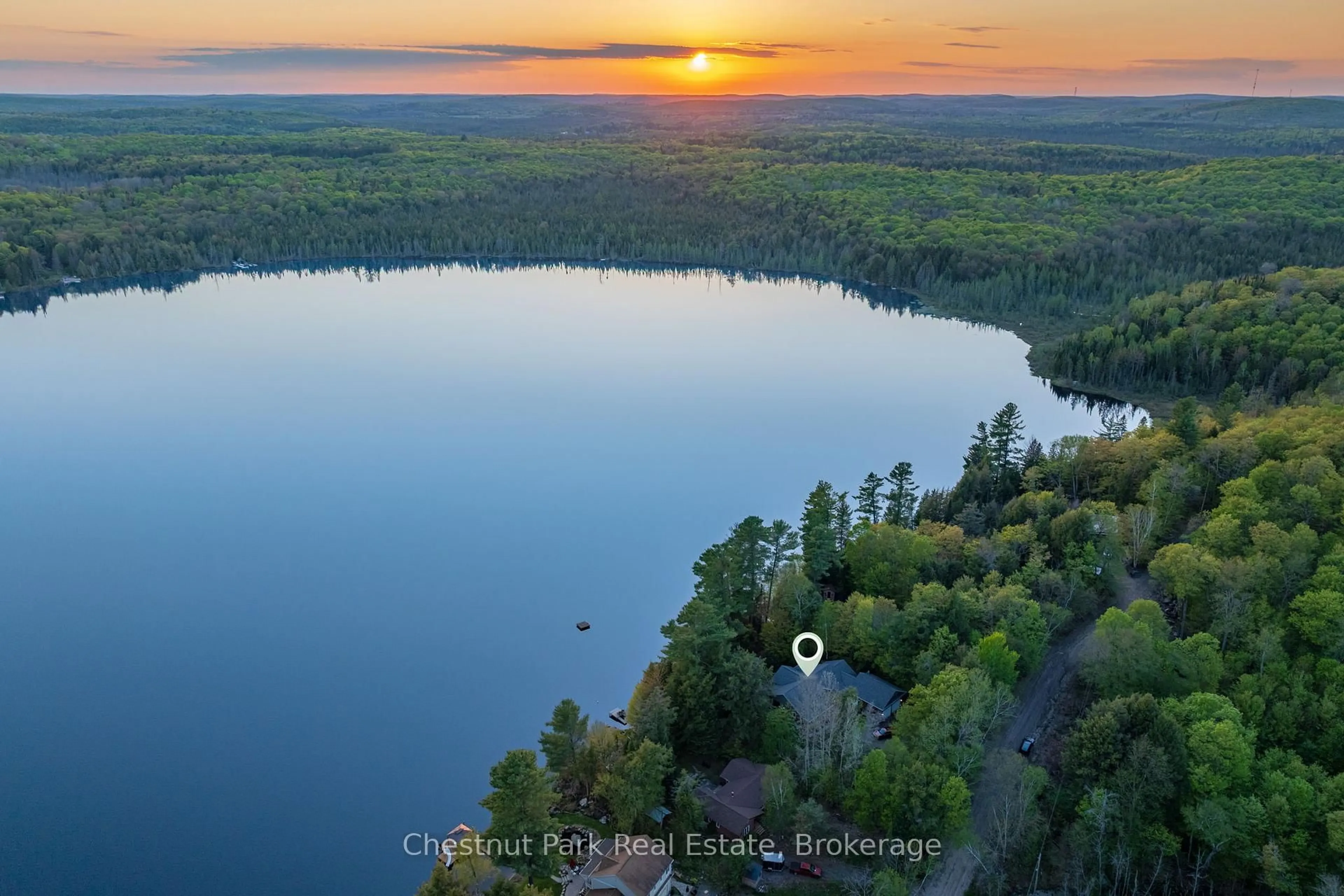 A pic from outside/outdoor area/front of a property/back of a property/a pic from drone, water/lake/river/ocean view for 132 Pinedale Rd, Perry Ontario P0A 1R0