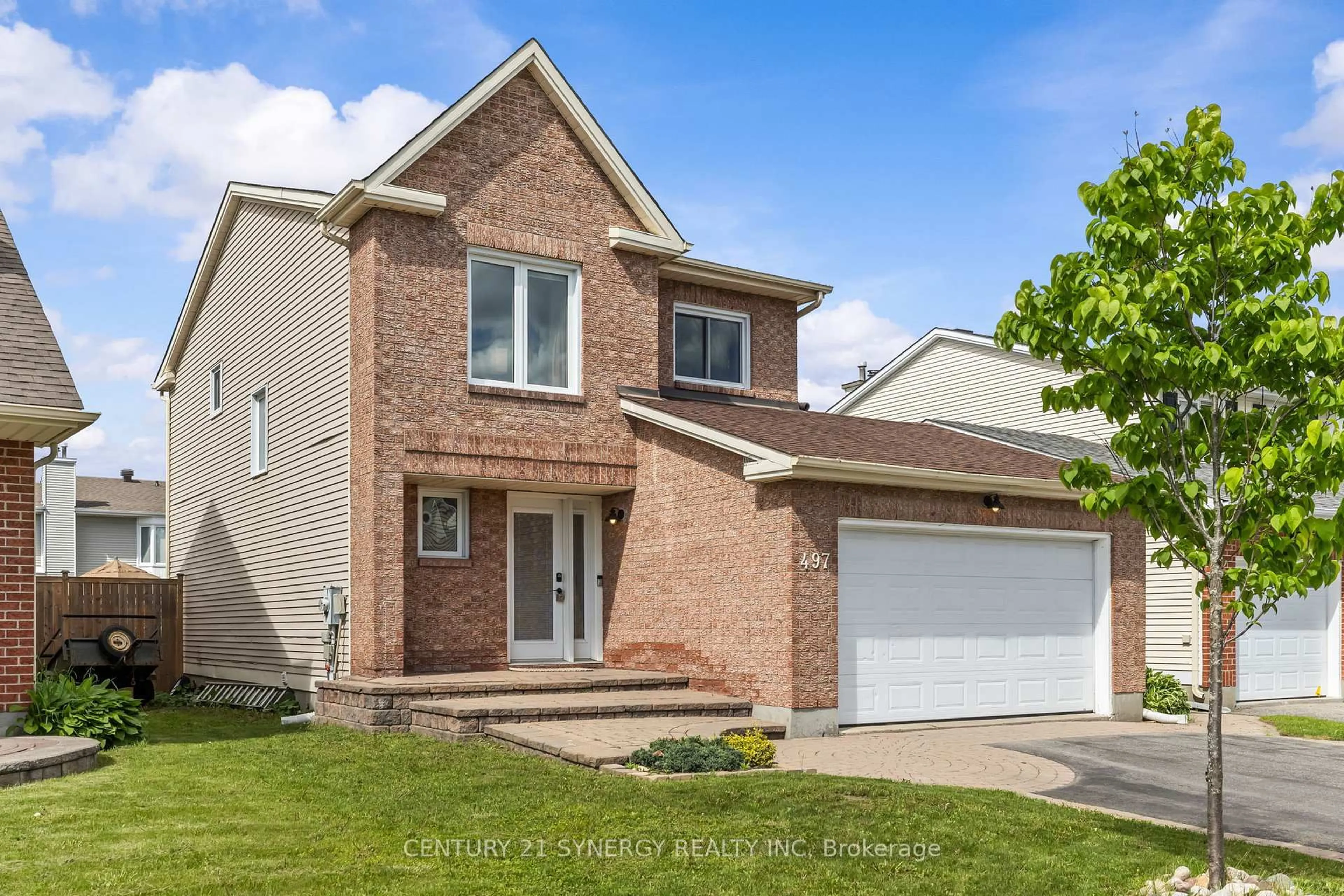 Home with brick exterior material, street for 497 Rougemount Cres, Orleans Ontario K4A 2Z7
