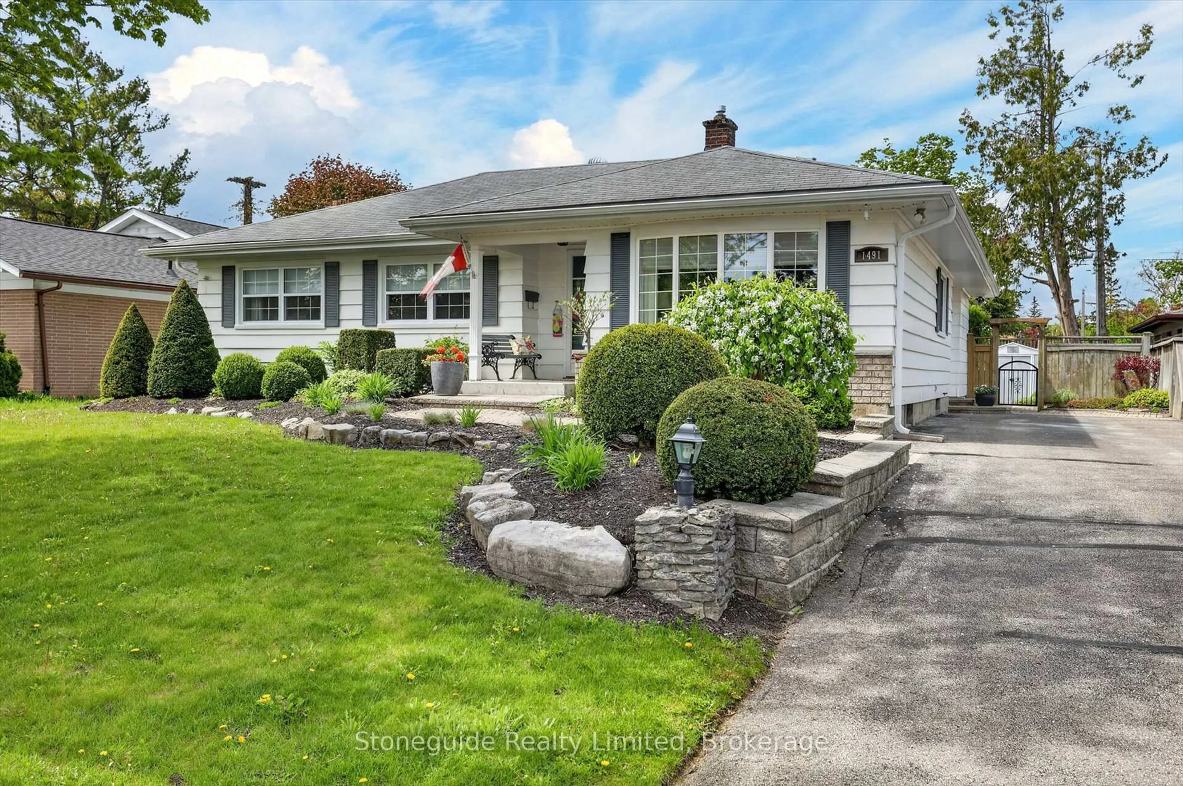 Home with vinyl exterior material, street for 1491 Windermere Ave, Peterborough Ontario K9J 6T1