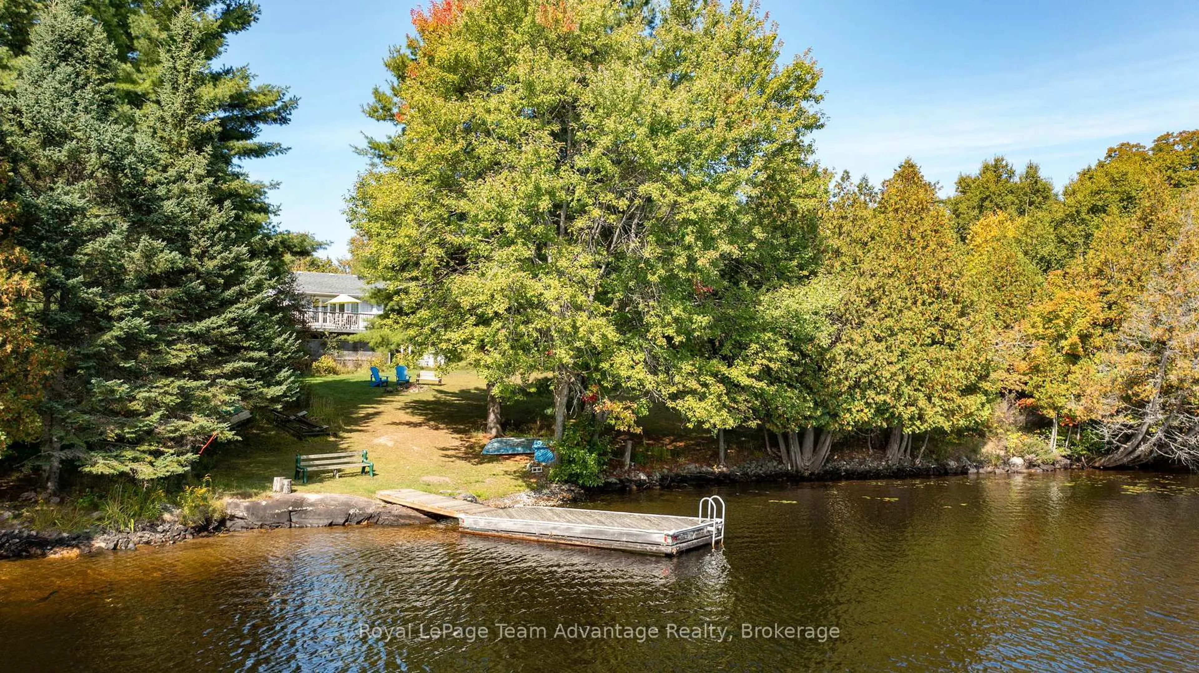 A pic from outside/outdoor area/front of a property/back of a property/a pic from drone, water/lake/river/ocean view for 22 Silver Birch Circ, McKellar Ontario P2A 0B5