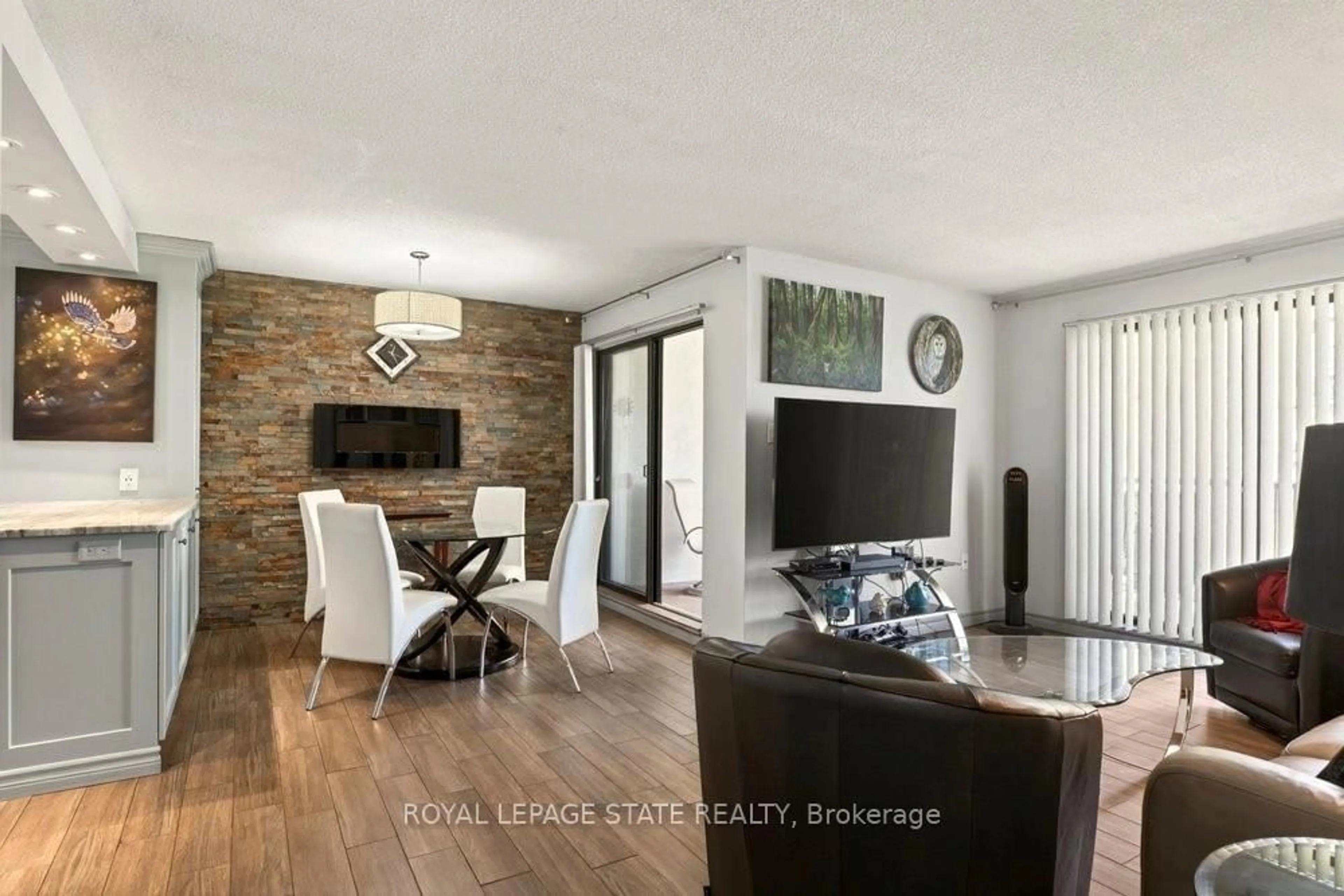 Living room with furniture, wood/laminate floor for 165 Bold St #403, Hamilton Ontario L8P 1V4