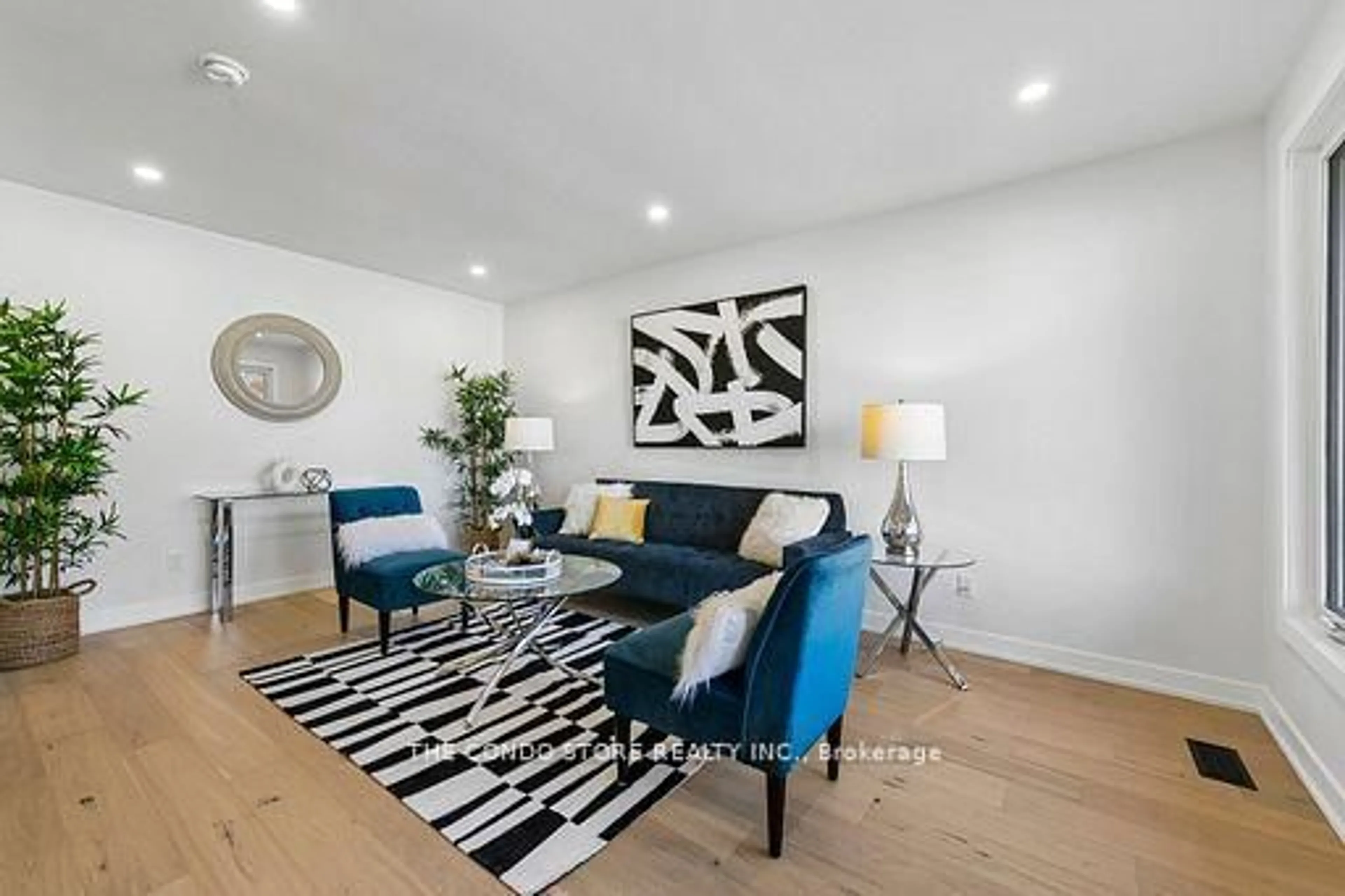 Living room with furniture, wood/laminate floor for 15 Colonial Crt, Hamilton Ontario L8K 4H2