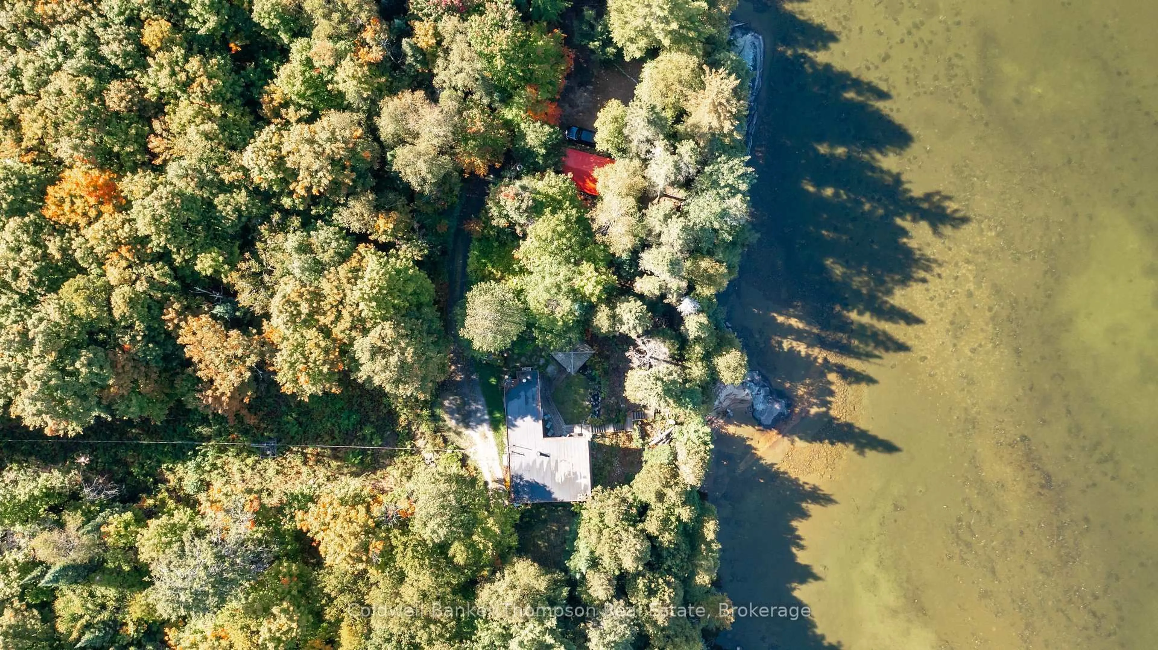 A pic from outside/outdoor area/front of a property/back of a property/a pic from drone, water/lake/river/ocean view for 1108 South Bernard Lake Rd, Sundridge Ontario P0A 1Z0