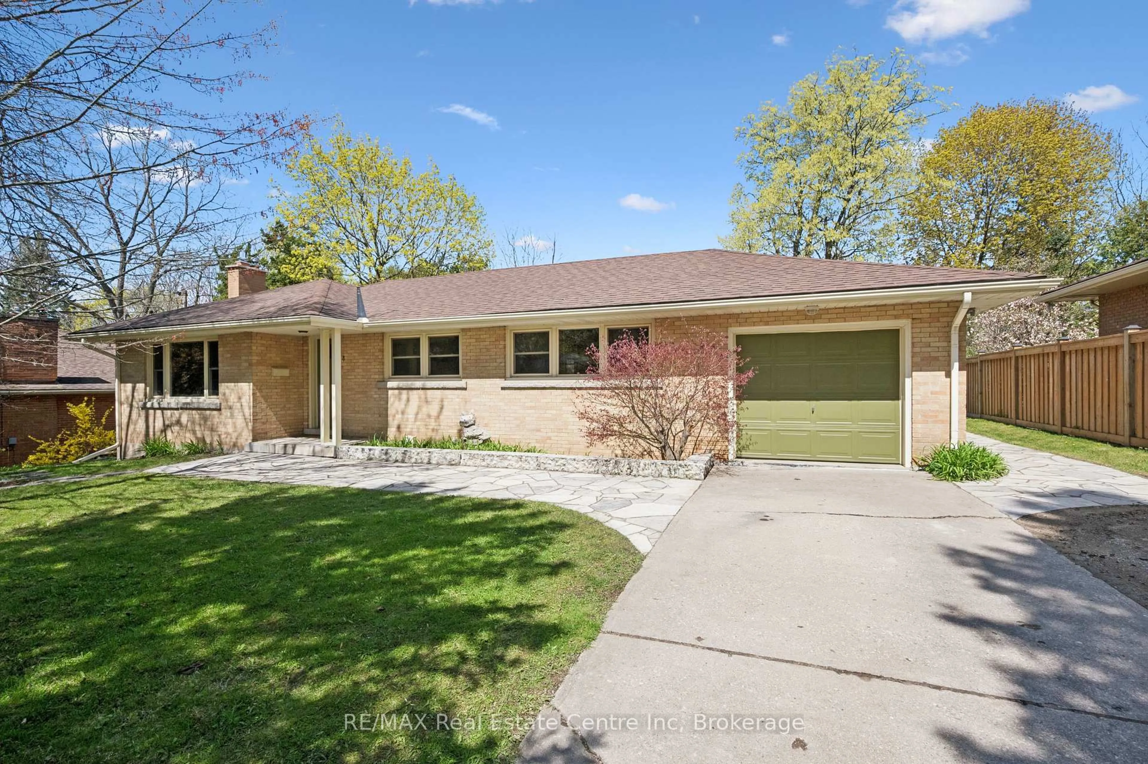 Home with brick exterior material, street for 8 Harcourt Dr, Guelph Ontario N1G 1J6