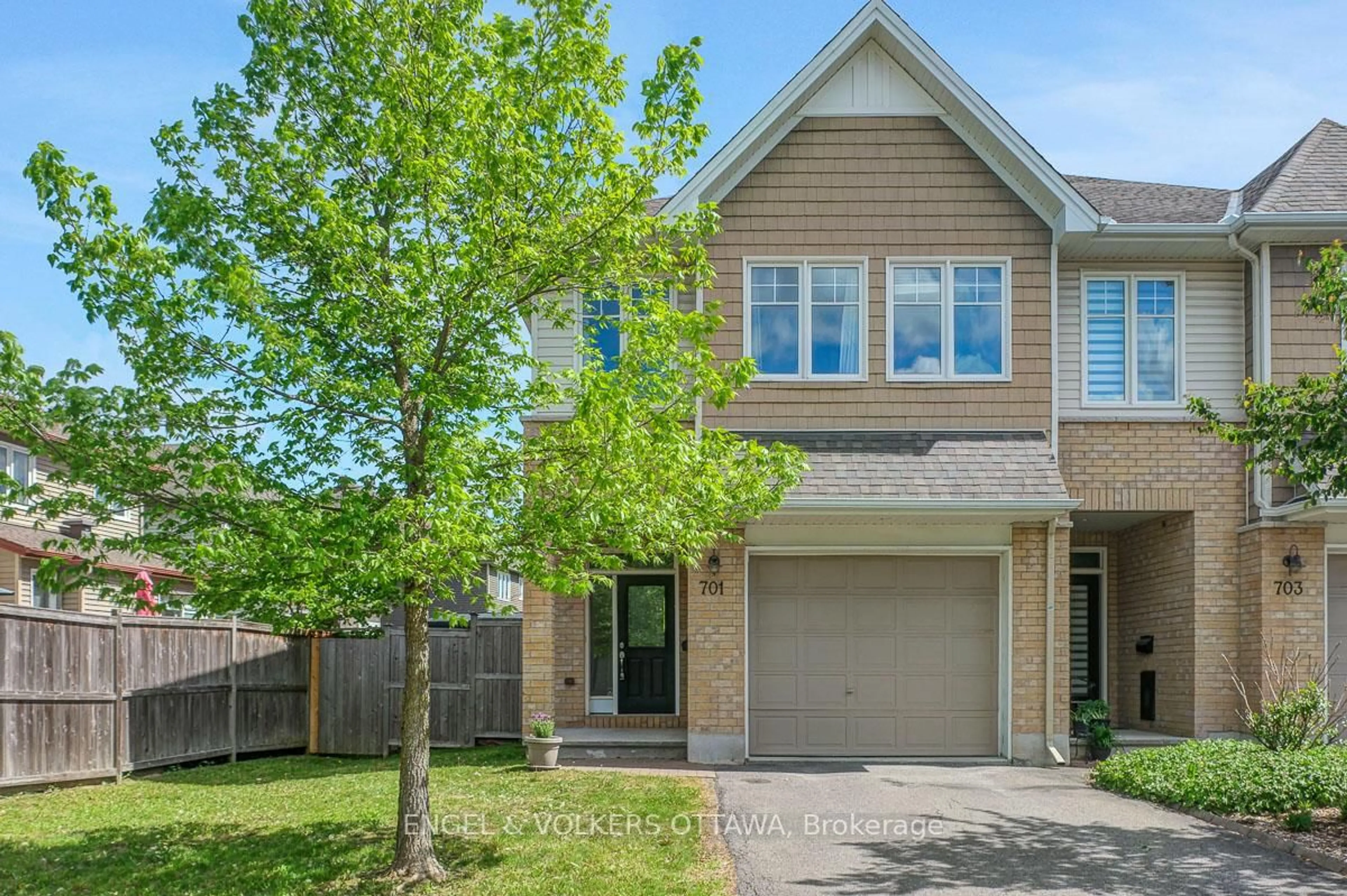 Home with brick exterior material, street for 701 Hazelnut Cres, Ottawa Ontario K1T 0K1