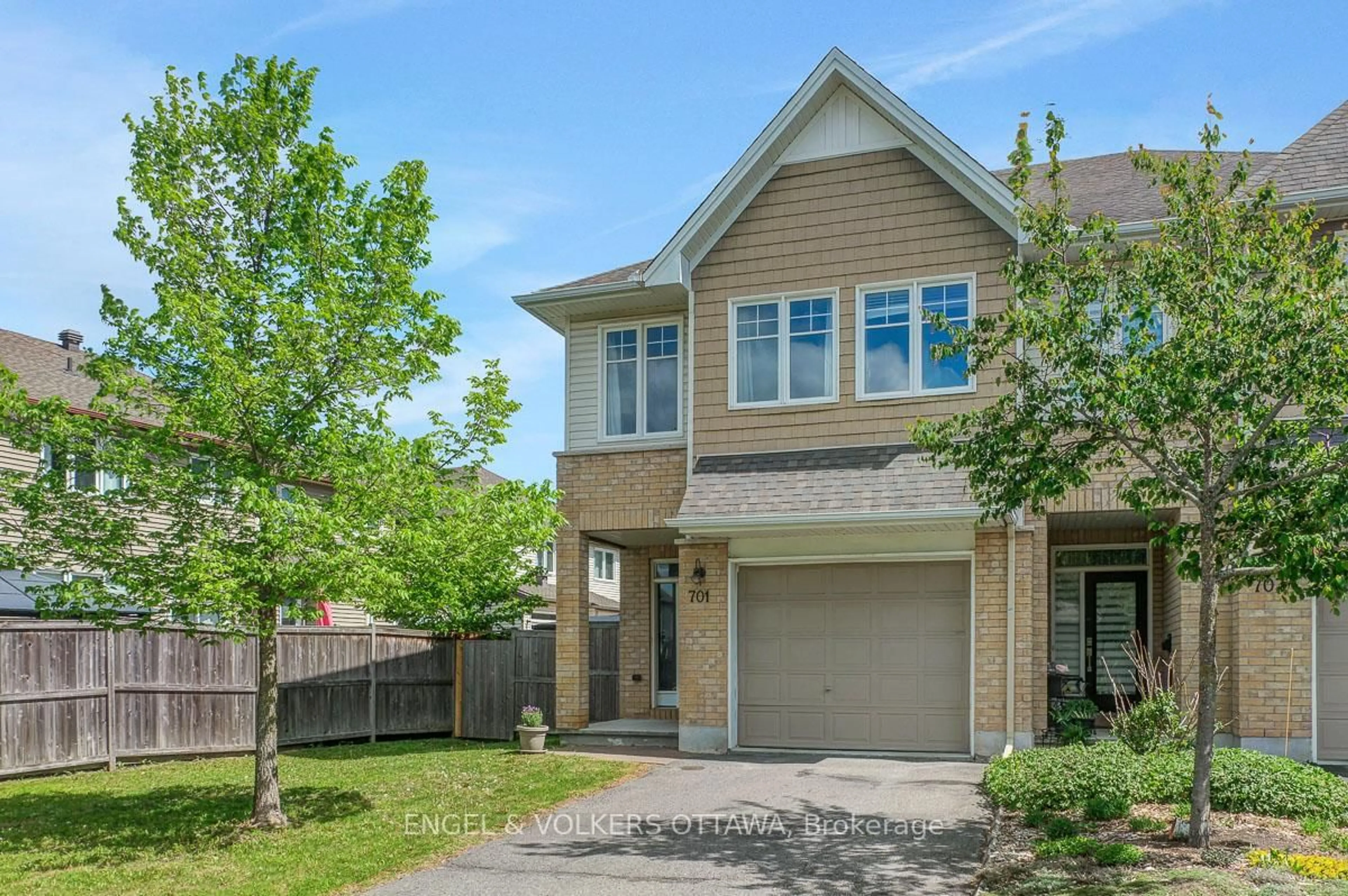 Home with brick exterior material, street for 701 Hazelnut Cres, Ottawa Ontario K1T 0K1