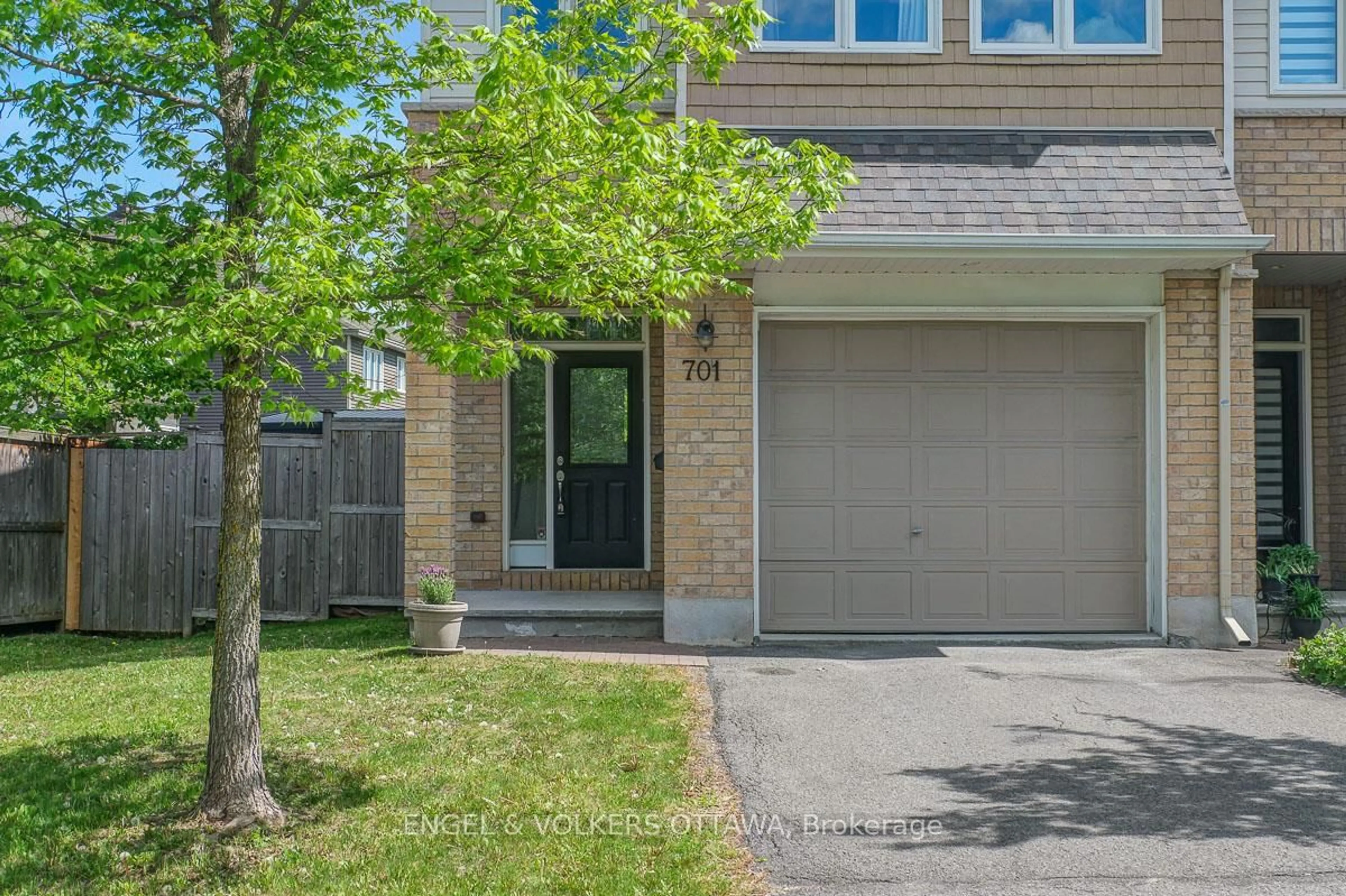 Home with brick exterior material, street for 701 Hazelnut Cres, Ottawa Ontario K1T 0K1
