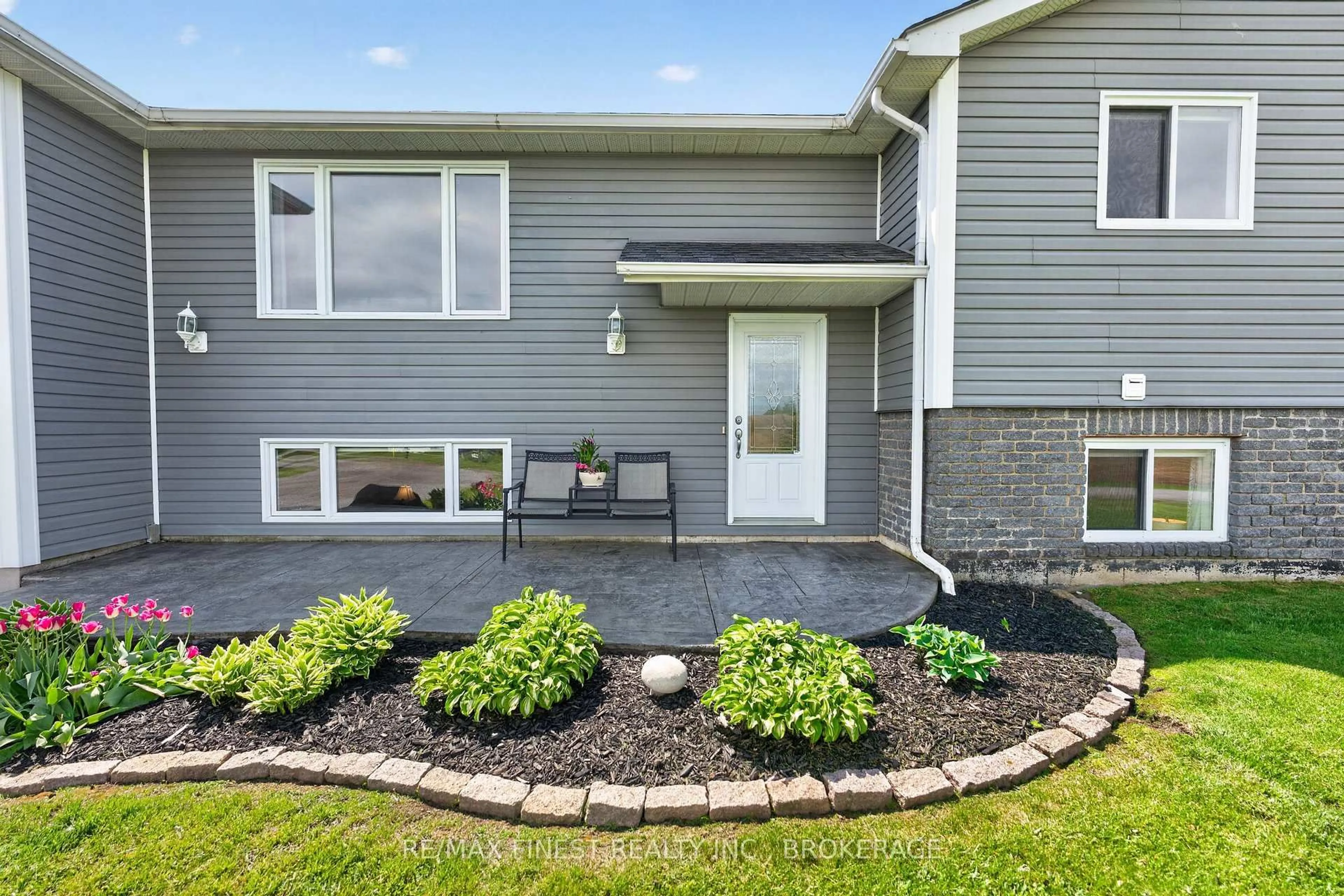 Home with vinyl exterior material, street for 14239 Telephone Rd, Cramahe Ontario K0K 1S0
