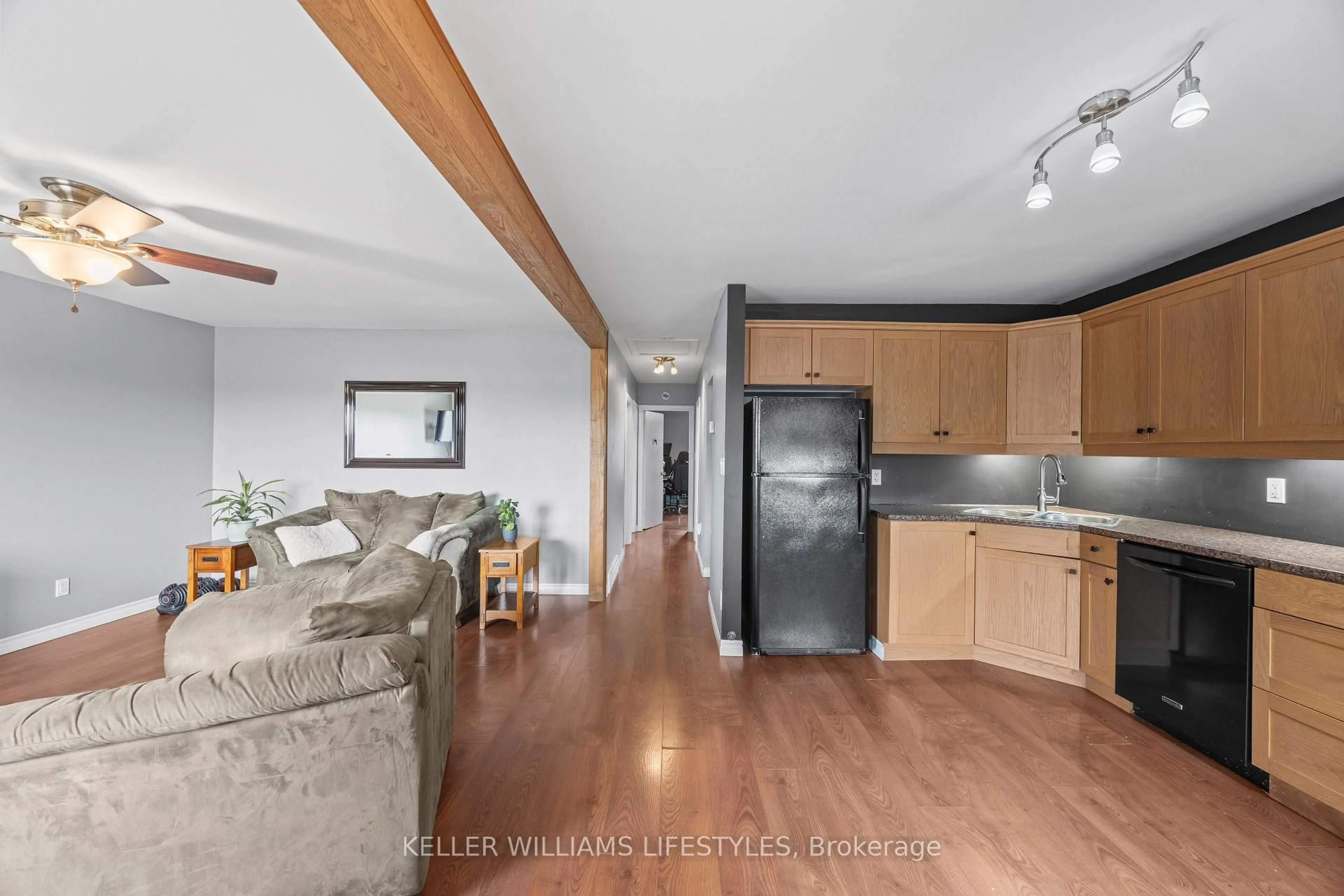 Open concept kitchen, wood/laminate floor for 258 Upper Queen St, Thames Centre Ontario N0M 2P0