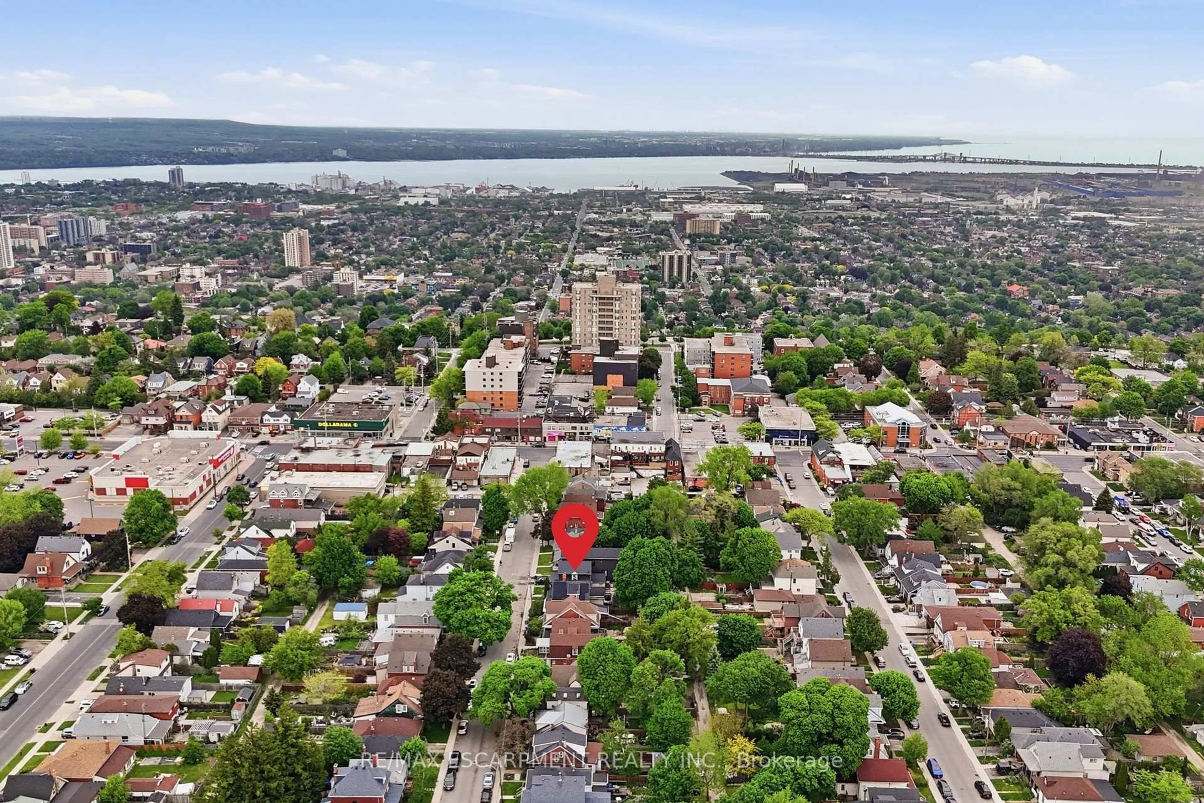 A pic from outside/outdoor area/front of a property/back of a property/a pic from drone, unknown for 23 East 21st St, Hamilton Ontario L8V 2T3