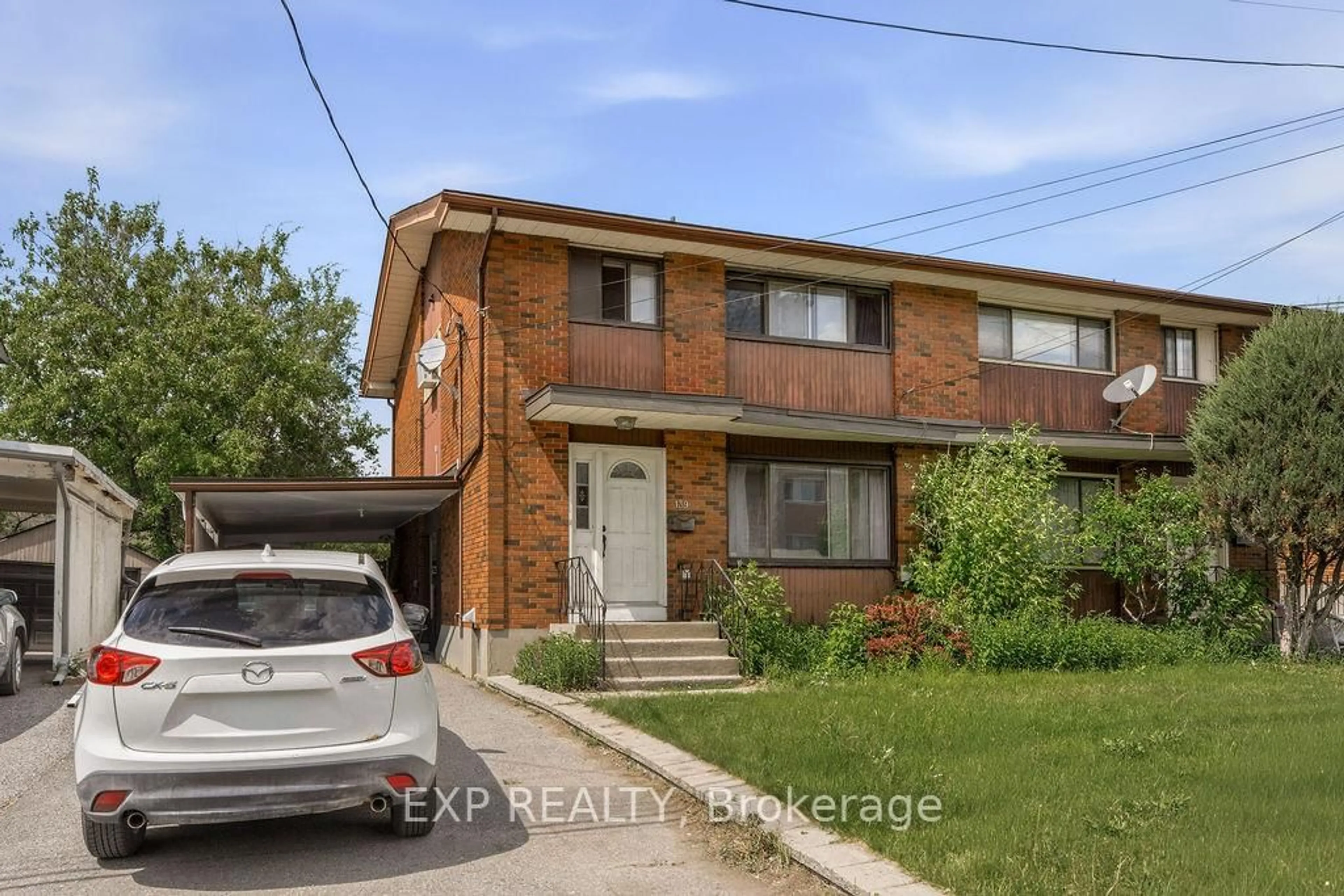 Home with brick exterior material, street for 139 Young St, Ottawa Ontario K1Y 3P8