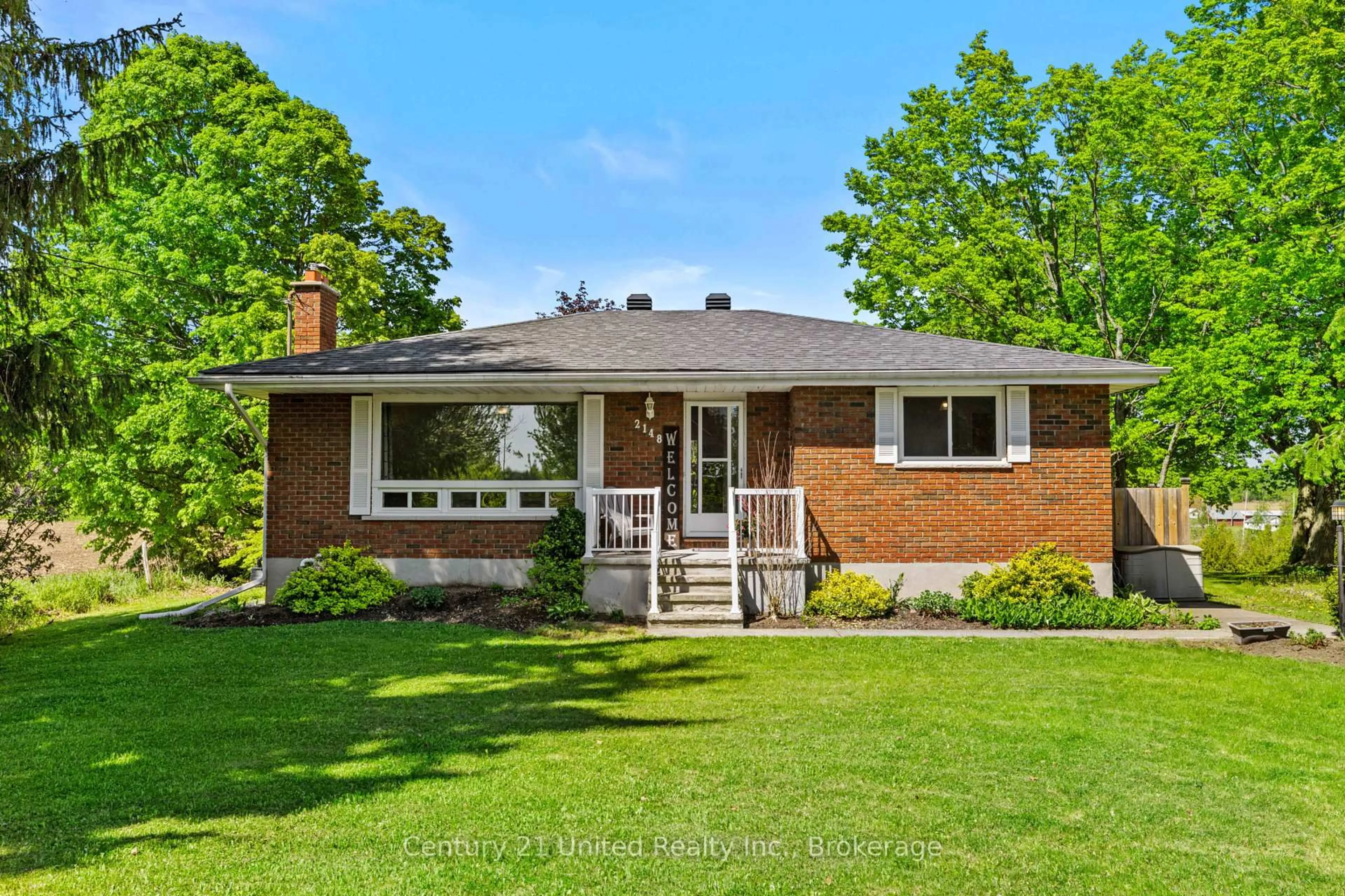 Home with brick exterior material, street for 2148 Heritage Line, Otonabee-South Monaghan Ontario K9J 6X8