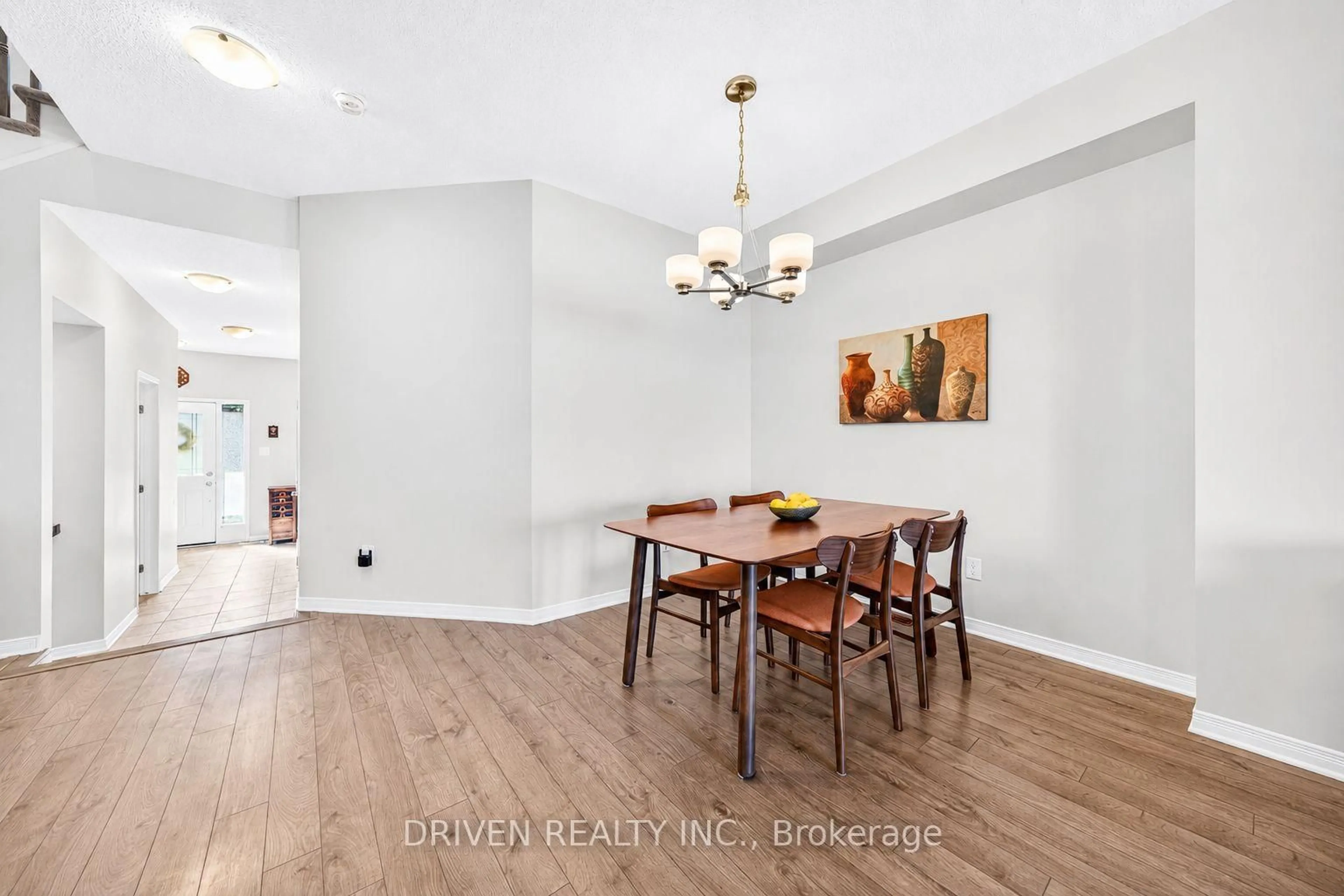 Dining room, wood/laminate floor for 627 Via Campanale Ave, Ottawa Ontario K2J 4A2
