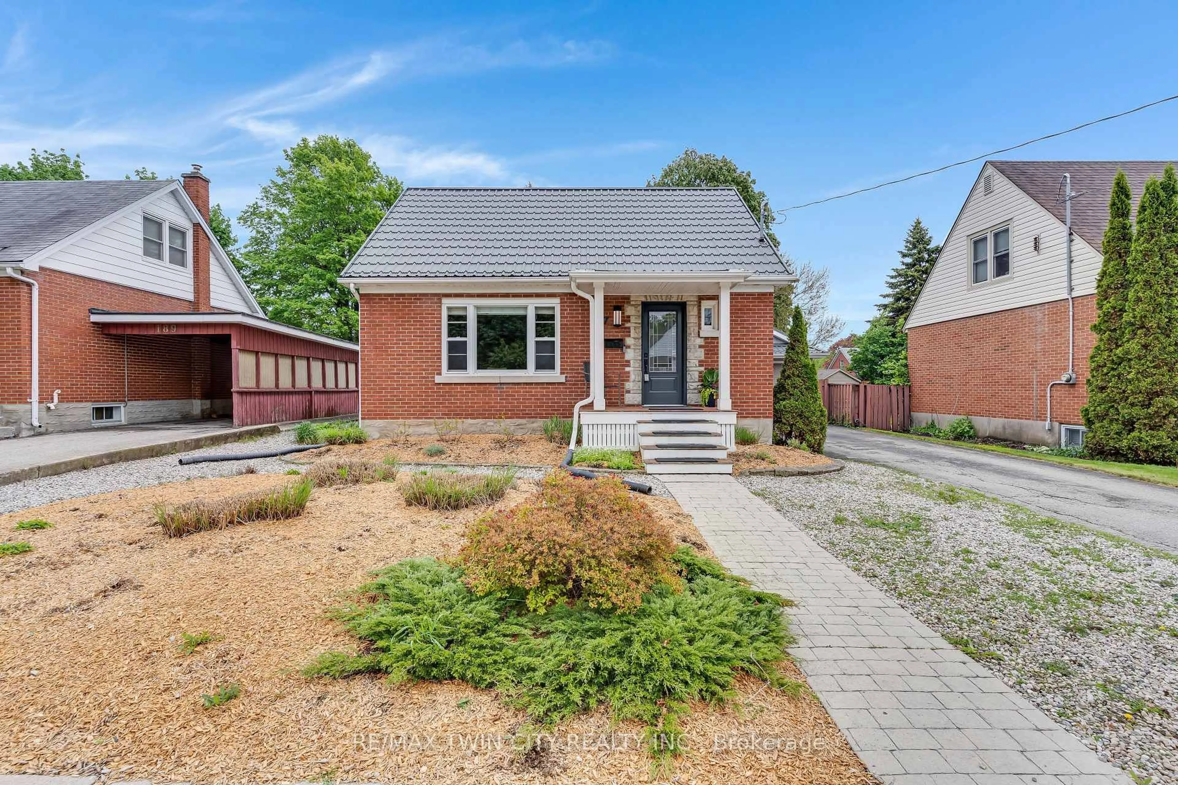 Home with brick exterior material, street for 187 Neilson Ave, Waterloo Ontario N2J 2L9