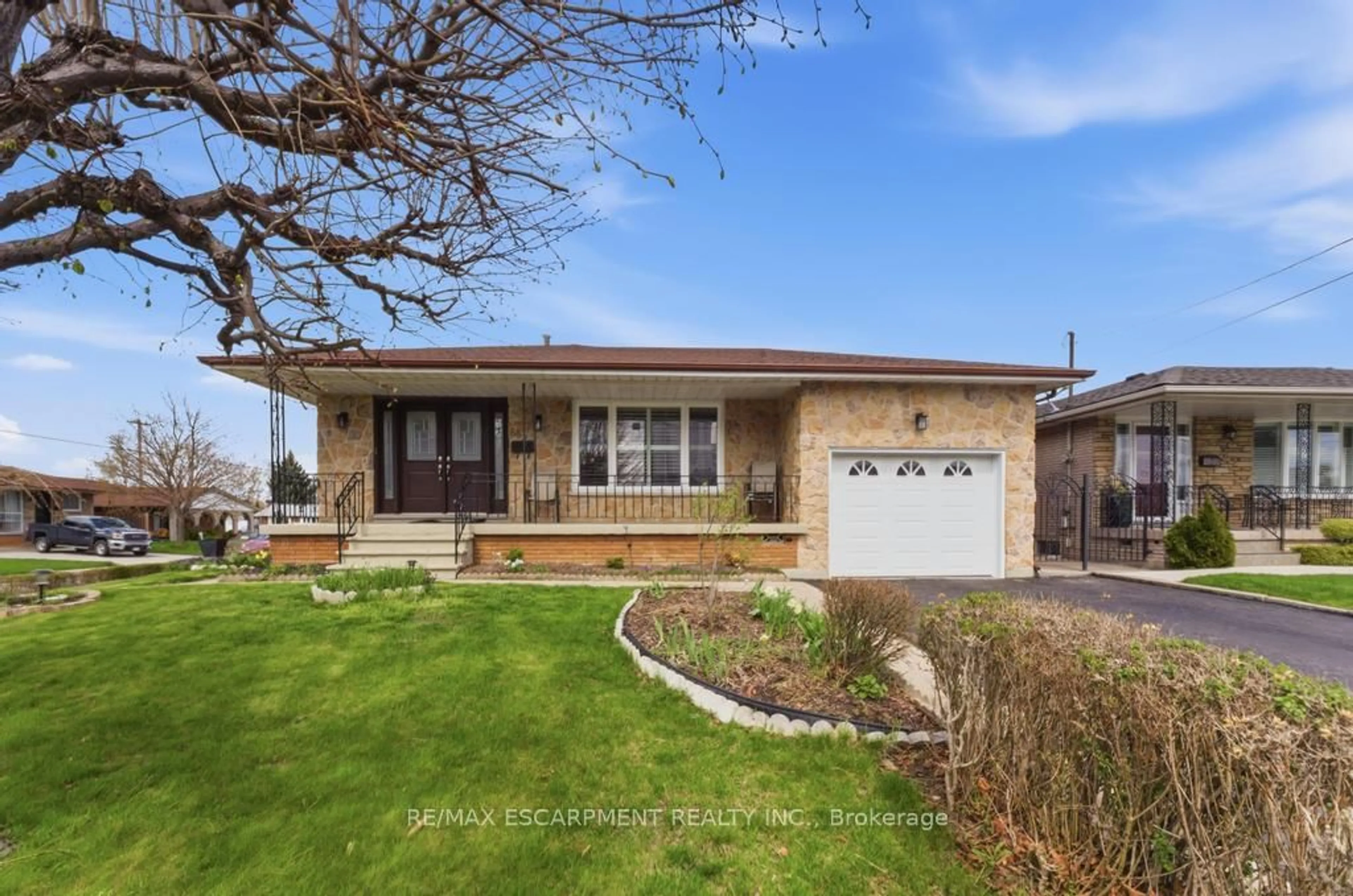 Home with brick exterior material, street for 68 Nugent Dr, Hamilton Ontario L8H 2M8