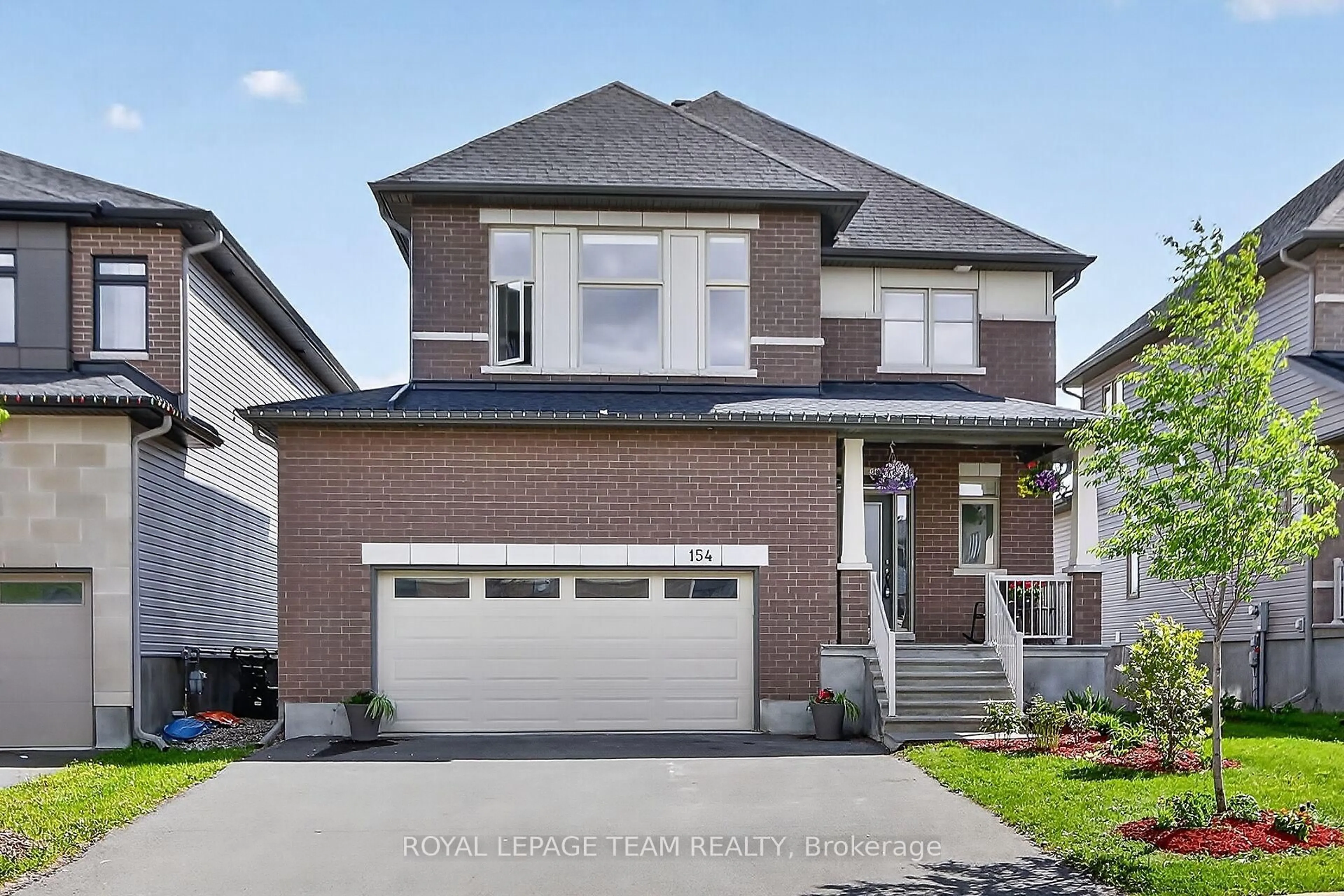Home with brick exterior material, street for 154 Winterhaven Dr, Orleans Ontario K1W 0P1