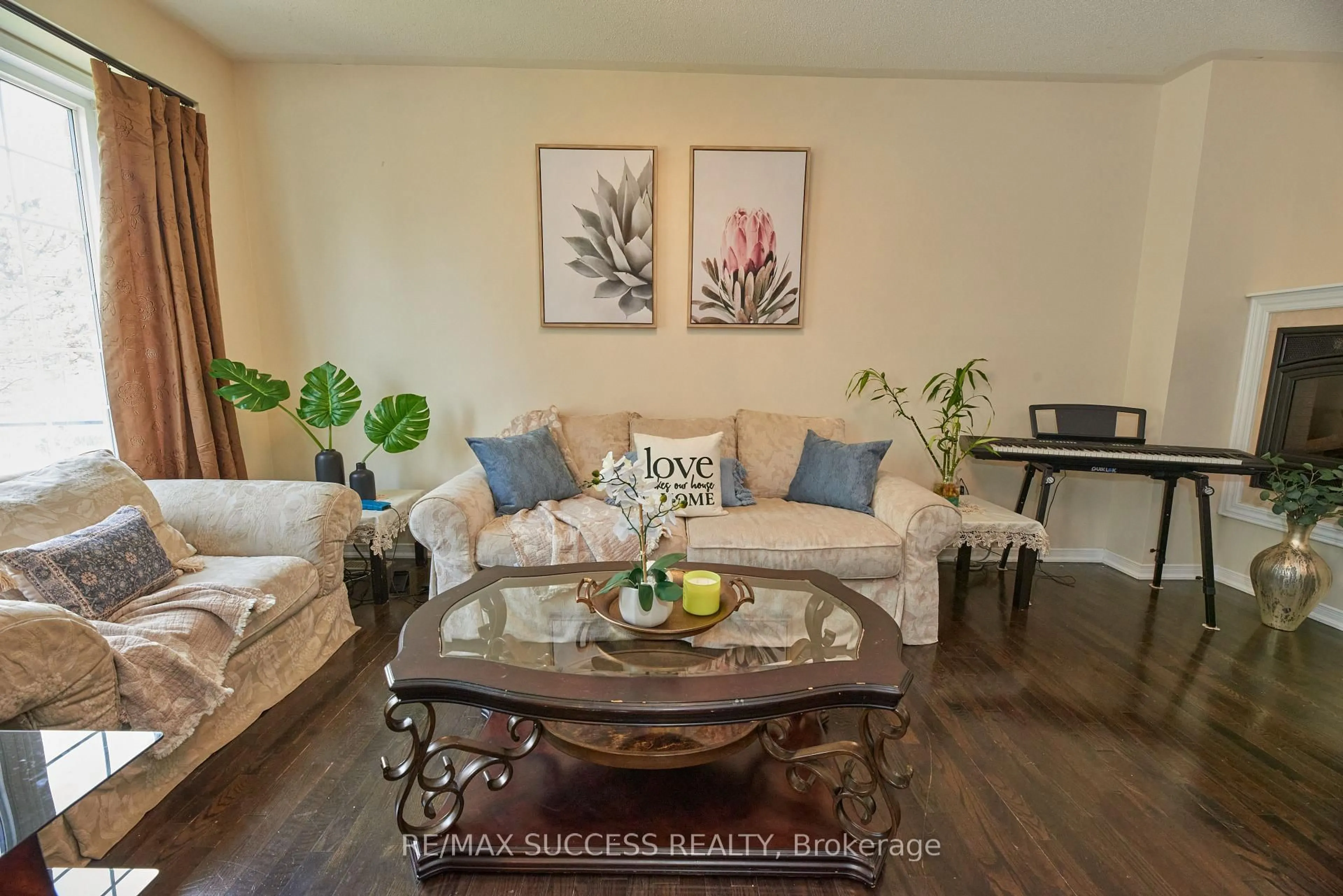 Living room with furniture, wood/laminate floor for 205 Nisbet Blvd, Hamilton Ontario L0R 2H9