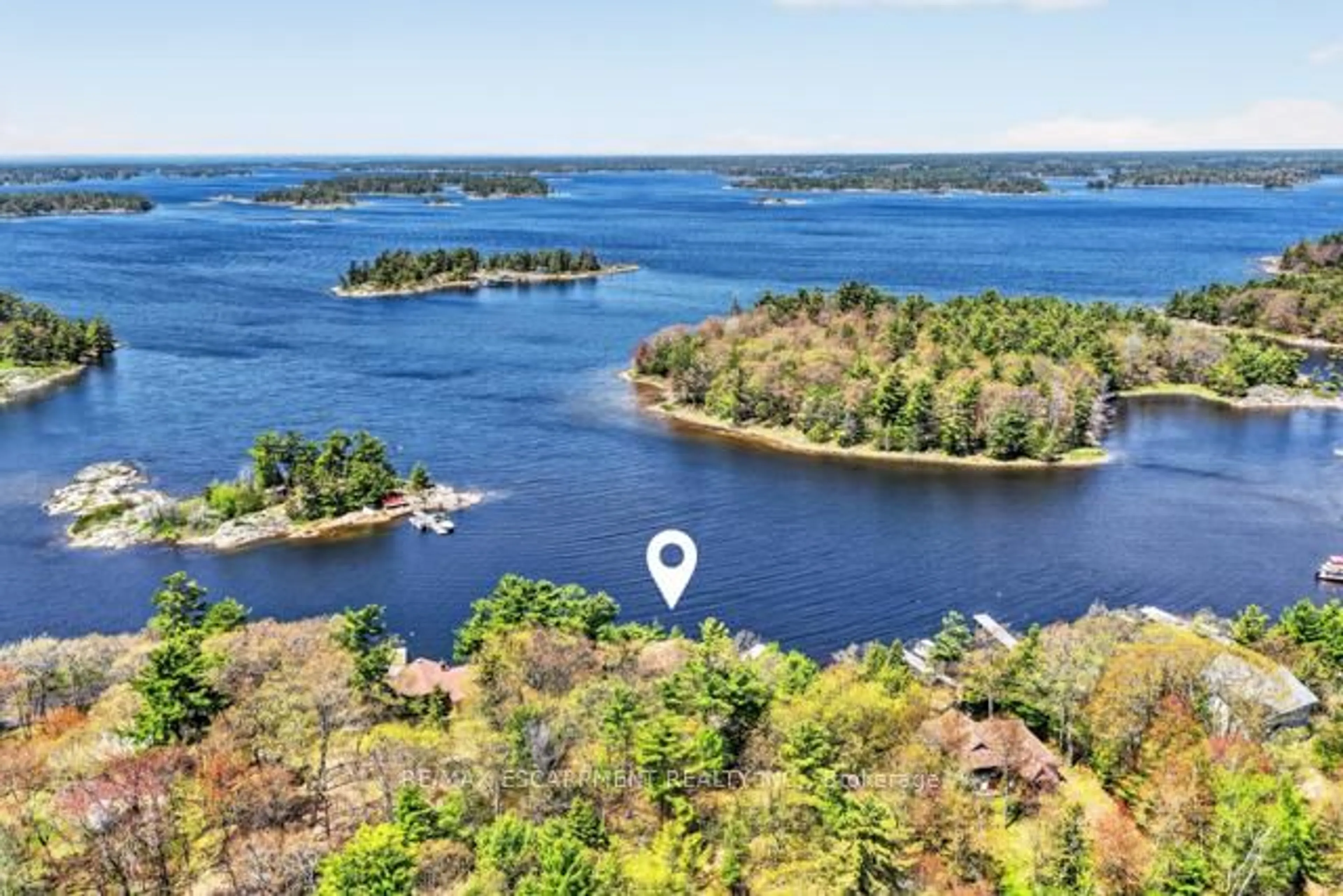 A pic from outside/outdoor area/front of a property/back of a property/a pic from drone, water/lake/river/ocean view for 29 GINN-BEACH Dr, The Archipelago Ontario P0G 1G0