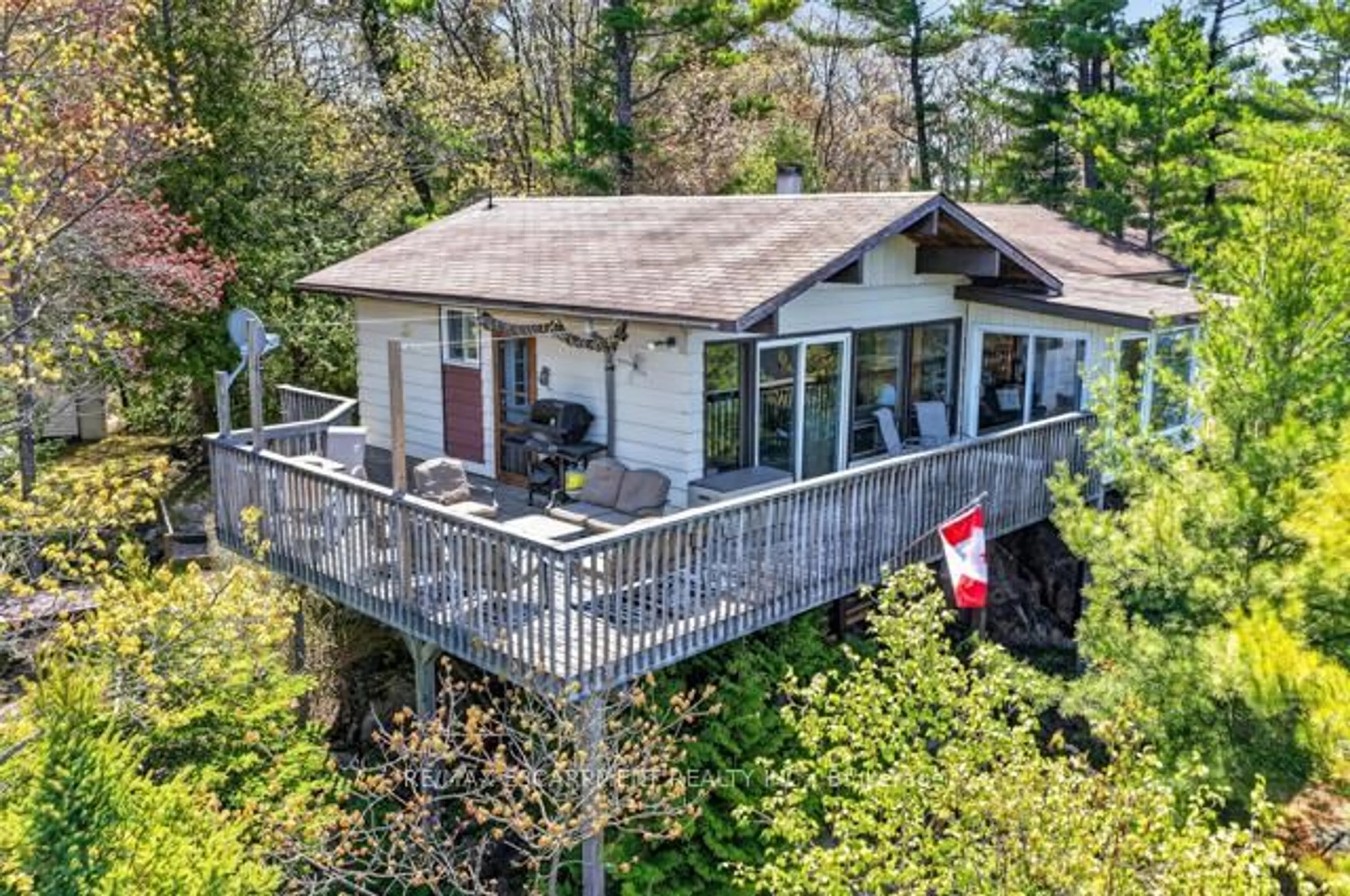 A pic from outside/outdoor area/front of a property/back of a property/a pic from drone, water/lake/river/ocean view for 29 GINN-BEACH Dr, The Archipelago Ontario P0G 1G0
