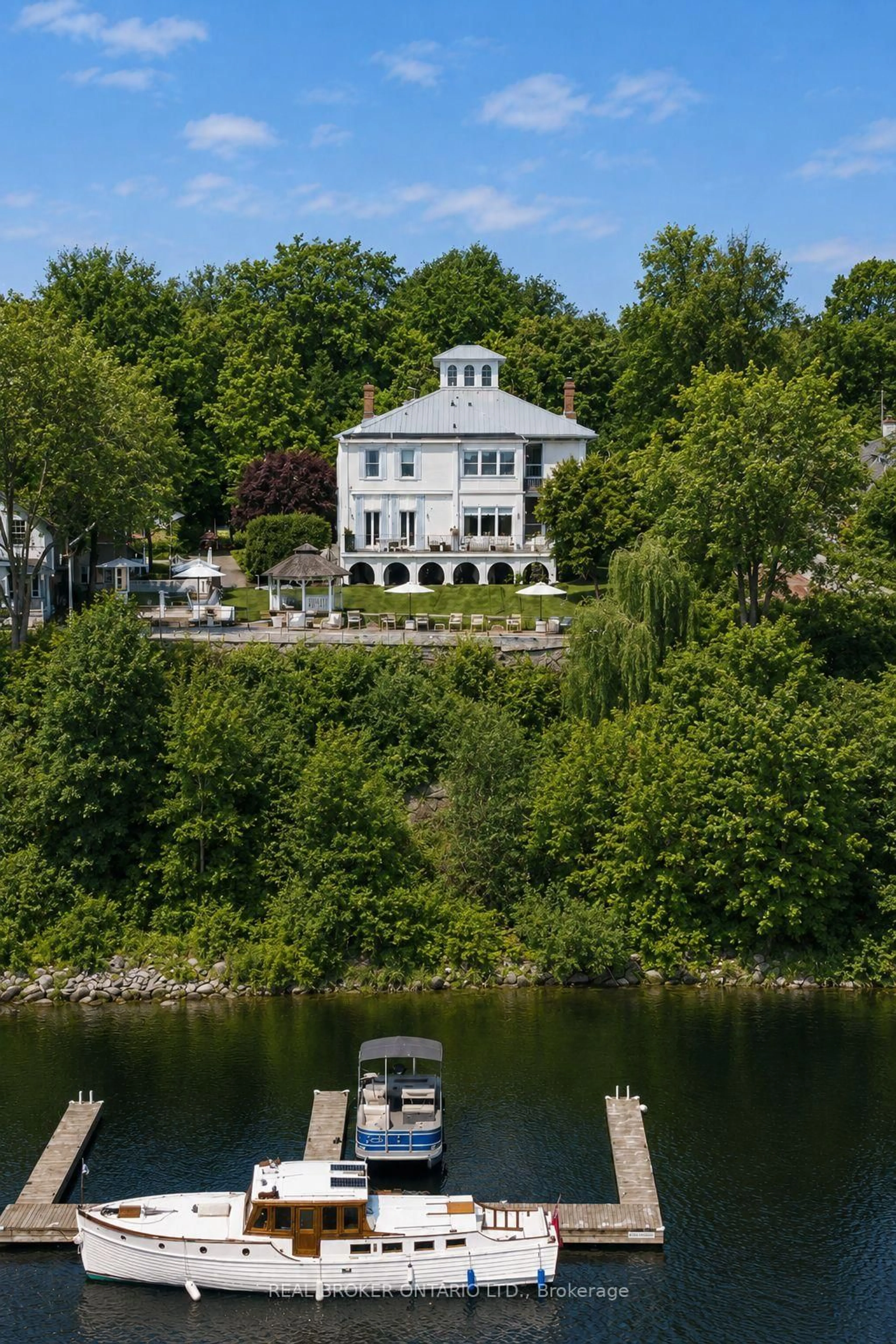 A pic from outside/outdoor area/front of a property/back of a property/a pic from drone, water/lake/river/ocean view for 346 Picton Main St, Prince Edward County Ontario K0K 2T0