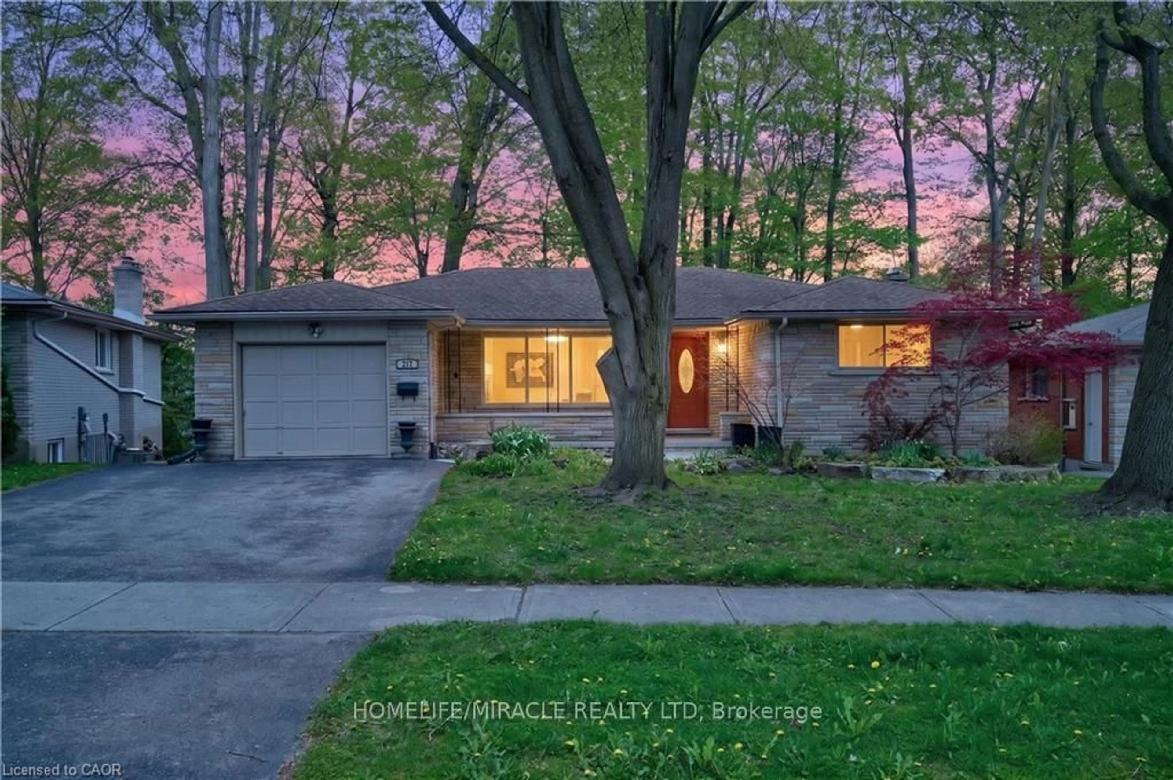 Home with brick exterior material, street for 217 Pinegrove Cres, Waterloo Ontario N2L 4V2