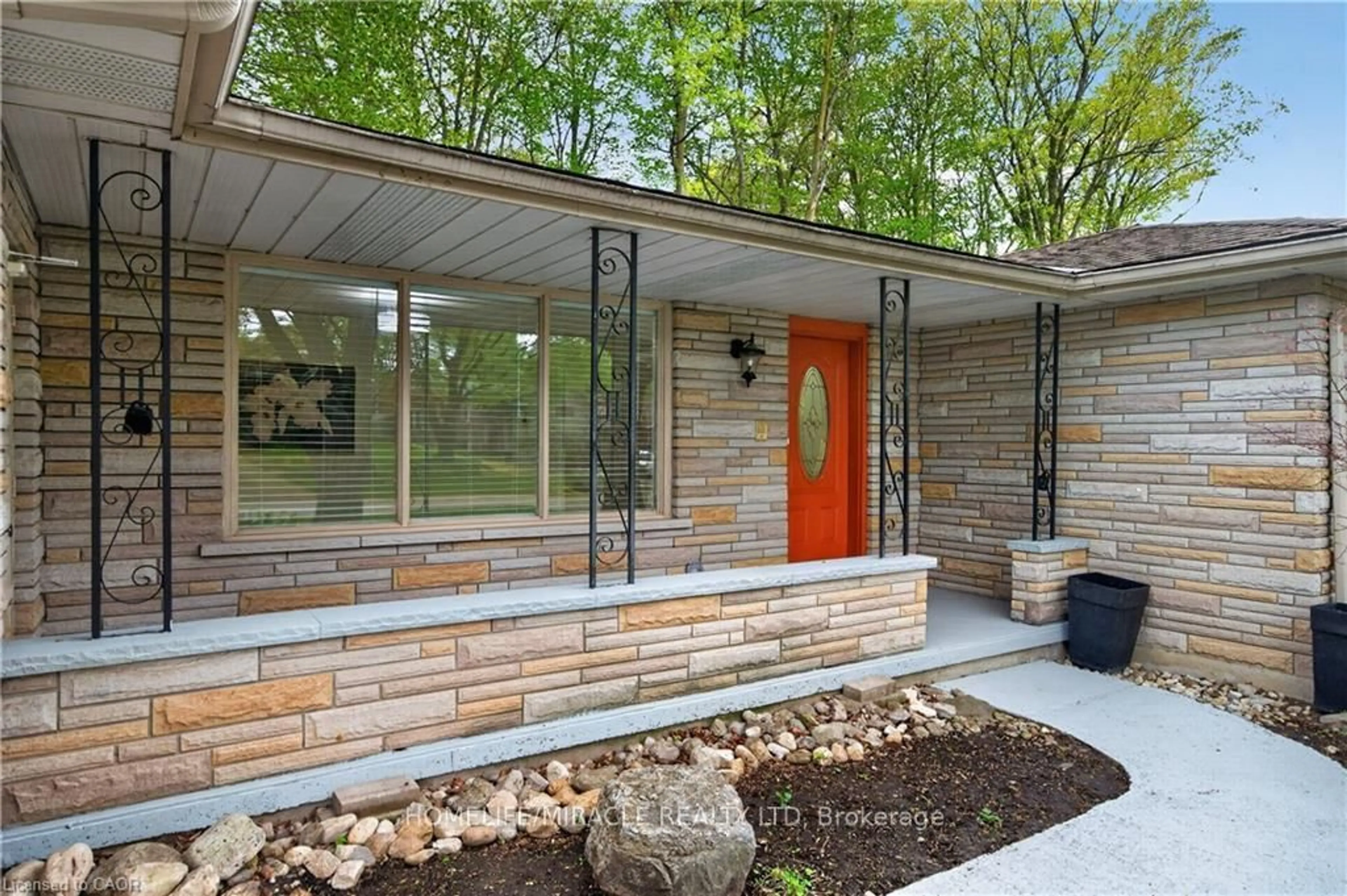 Home with brick exterior material, street for 217 Pinegrove Cres, Waterloo Ontario N2L 4V2