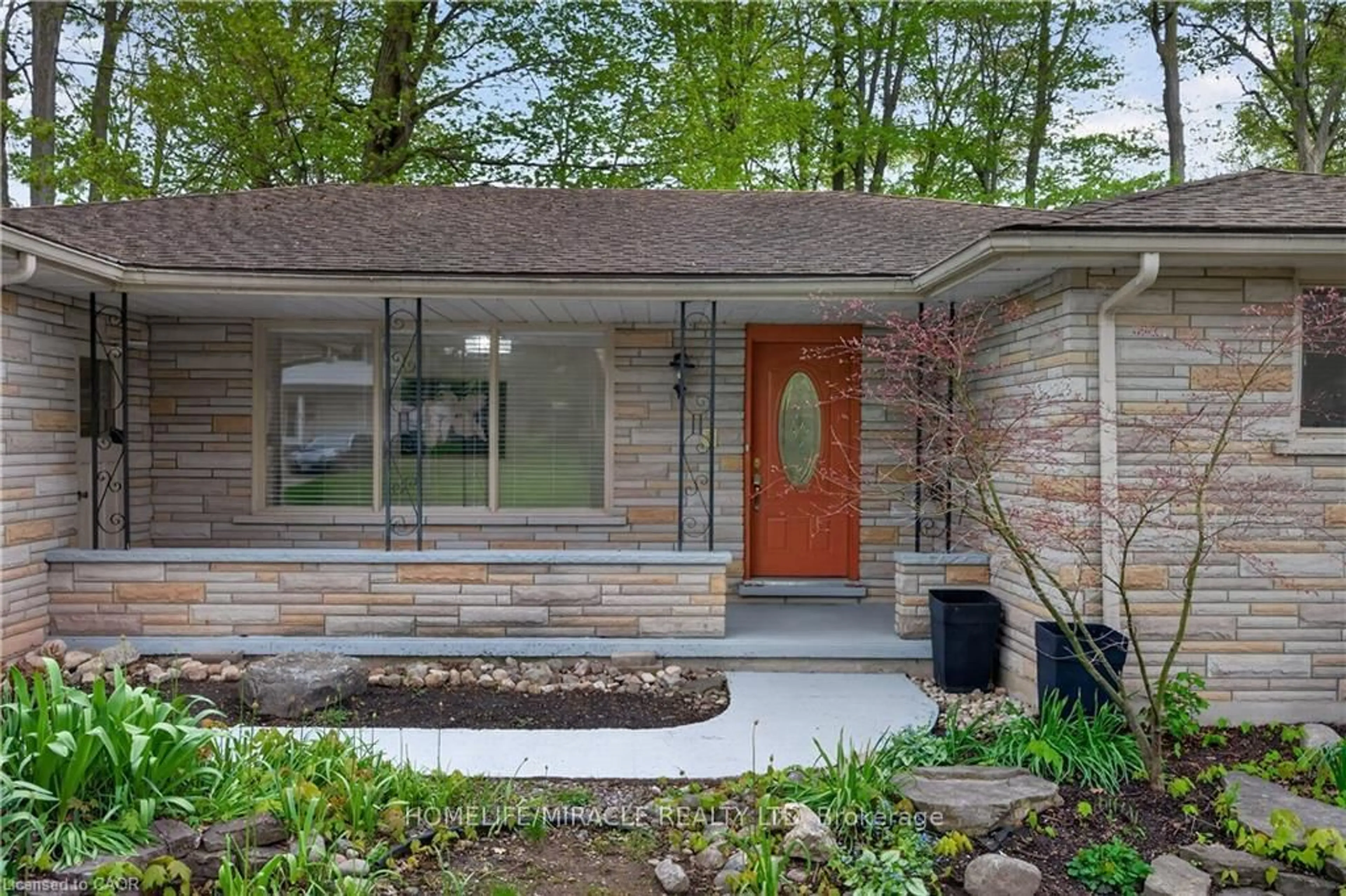 Home with brick exterior material, street for 217 Pinegrove Cres, Waterloo Ontario N2L 4V2