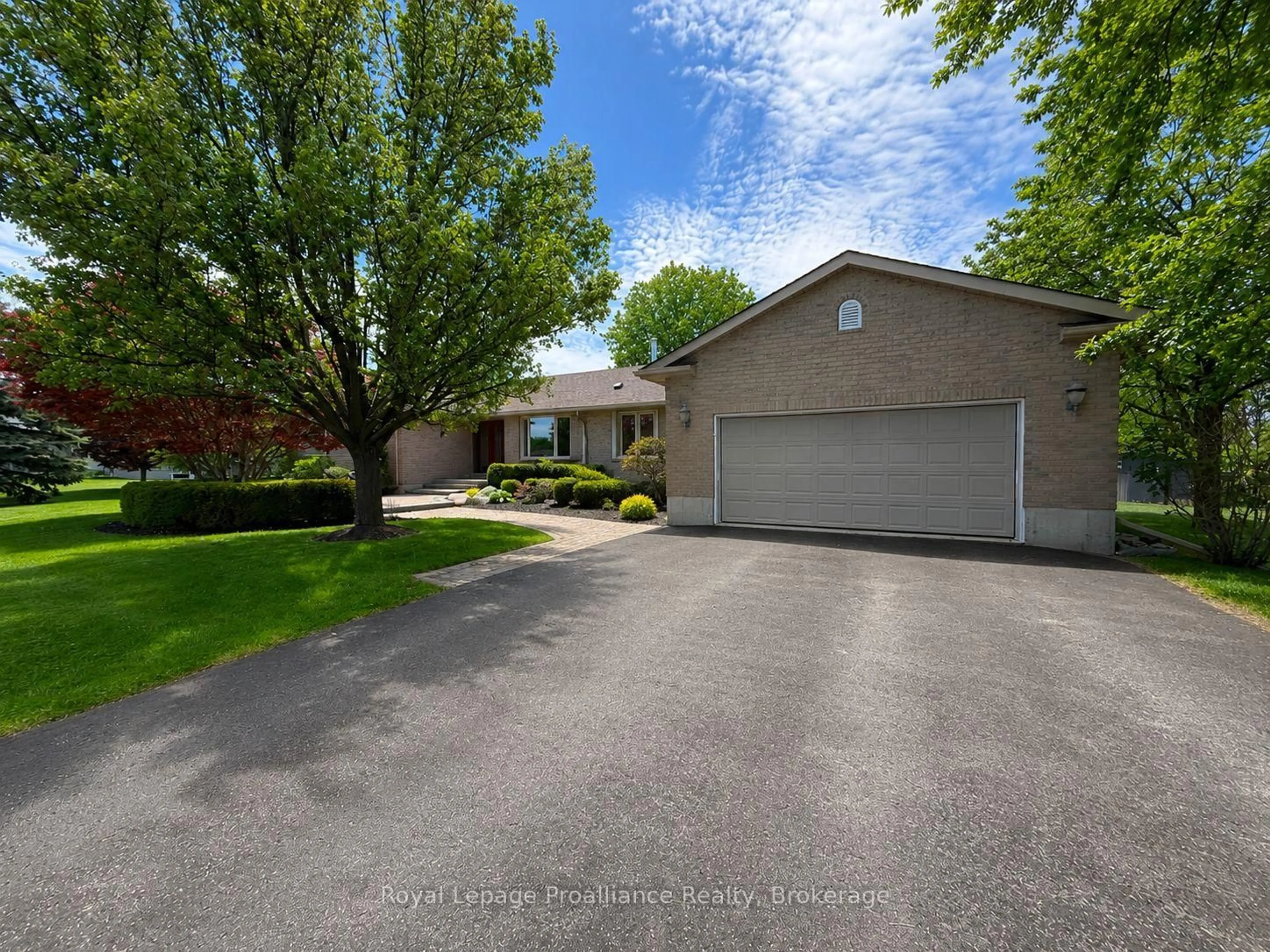 A pic from outside/outdoor area/front of a property/back of a property/a pic from drone, street for 100 Bay Breeze St, Prince Edward County Ontario K8N 0L4