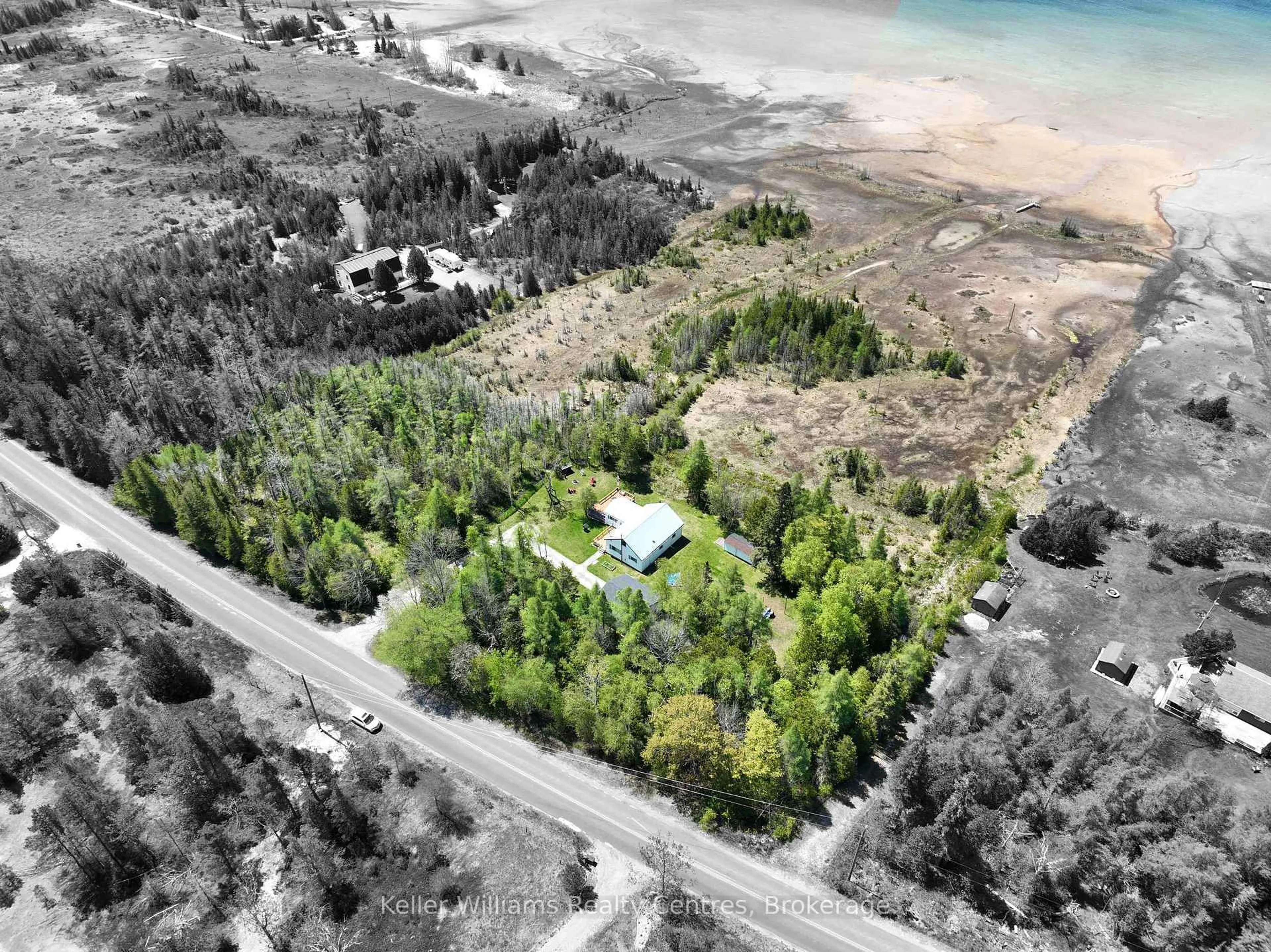 A pic from outside/outdoor area/front of a property/back of a property/a pic from drone, water/lake/river/ocean view for 621 Huron Rd, South Bruce Peninsula Ontario N0H 2T0