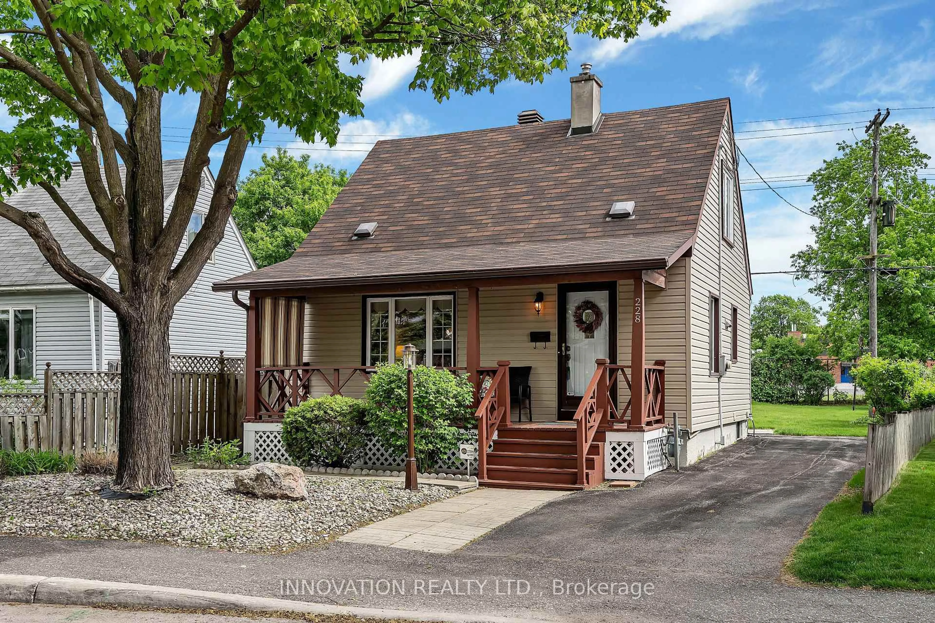 Home with vinyl exterior material, street for 228 Crerar Ave, Ottawa Ontario K1Z 7P3