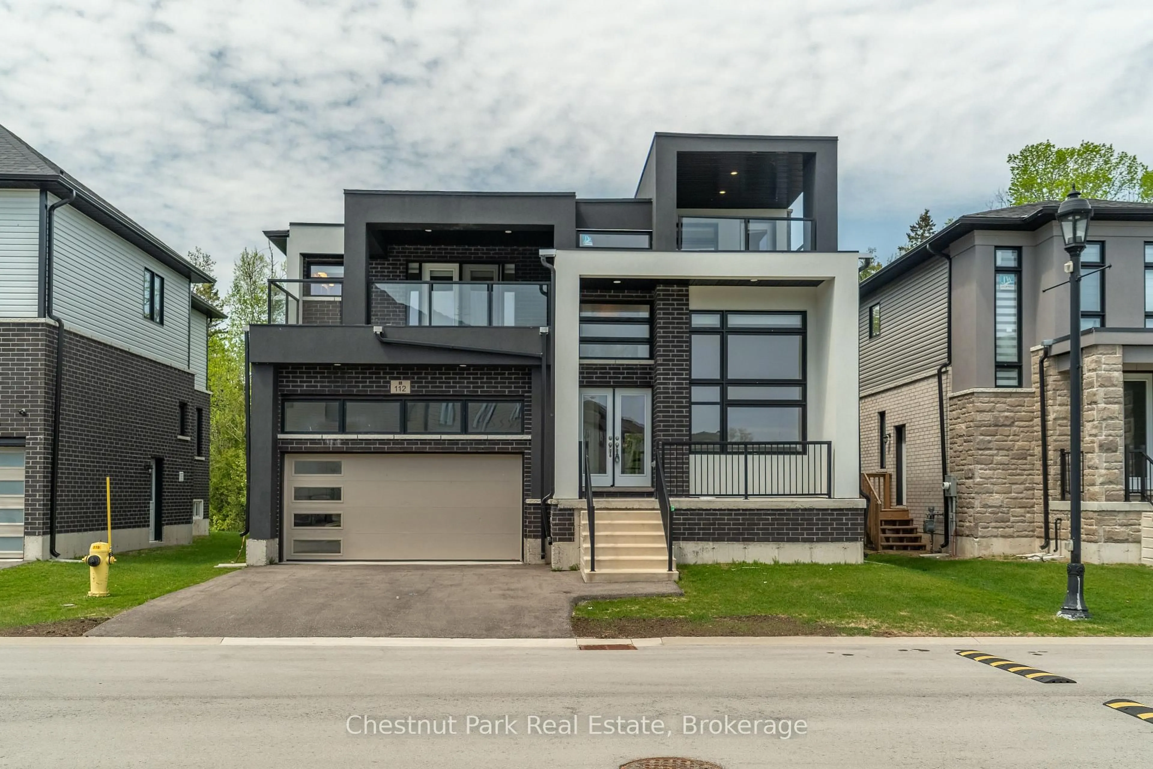 Home with brick exterior material, street for 112 Sebastian St, Blue Mountains Ontario N0H 1J0