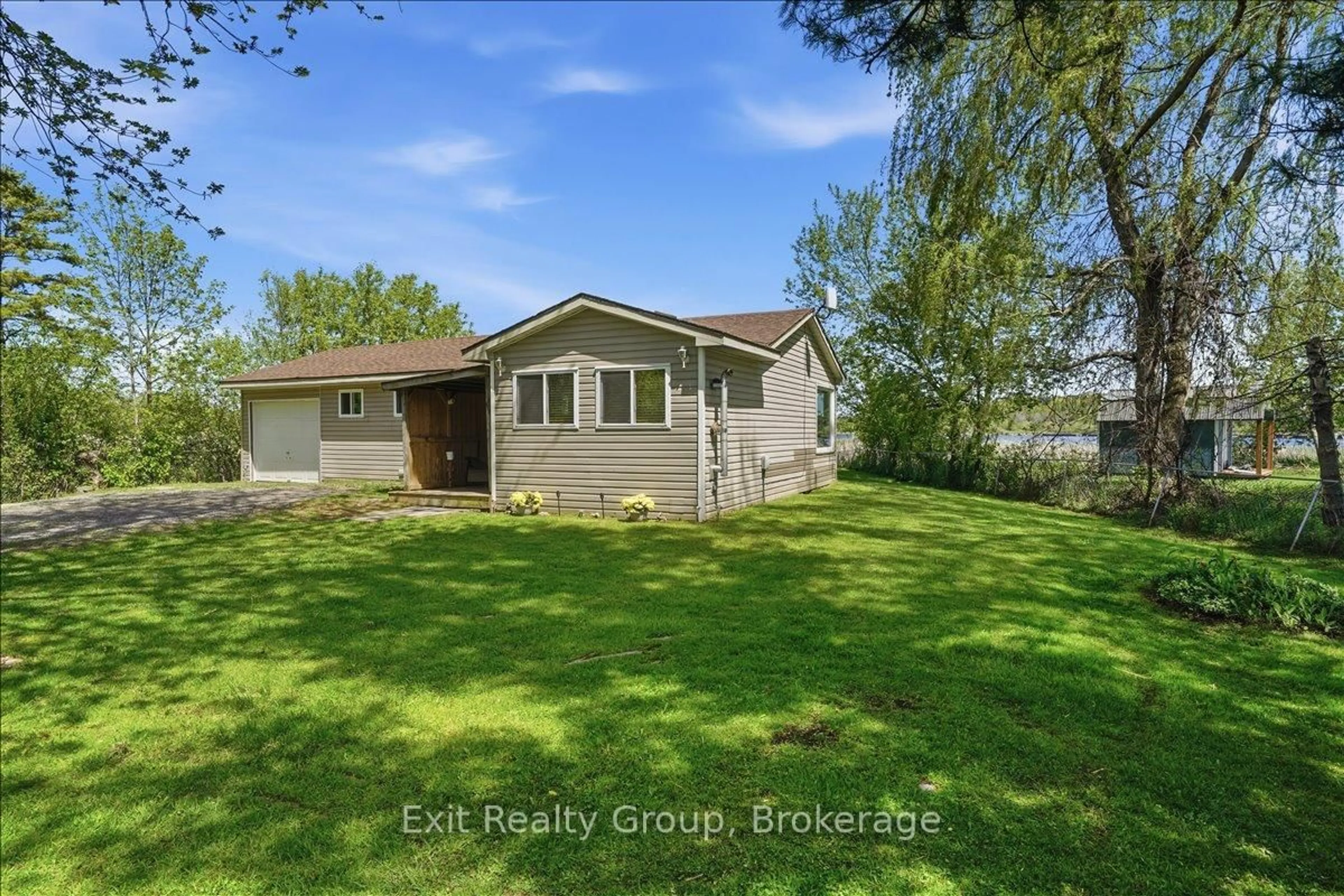 A pic from outside/outdoor area/front of a property/back of a property/a pic from drone, water/lake/river/ocean view for 33 Willow Point Rd, Brighton Ontario K0K 1H0