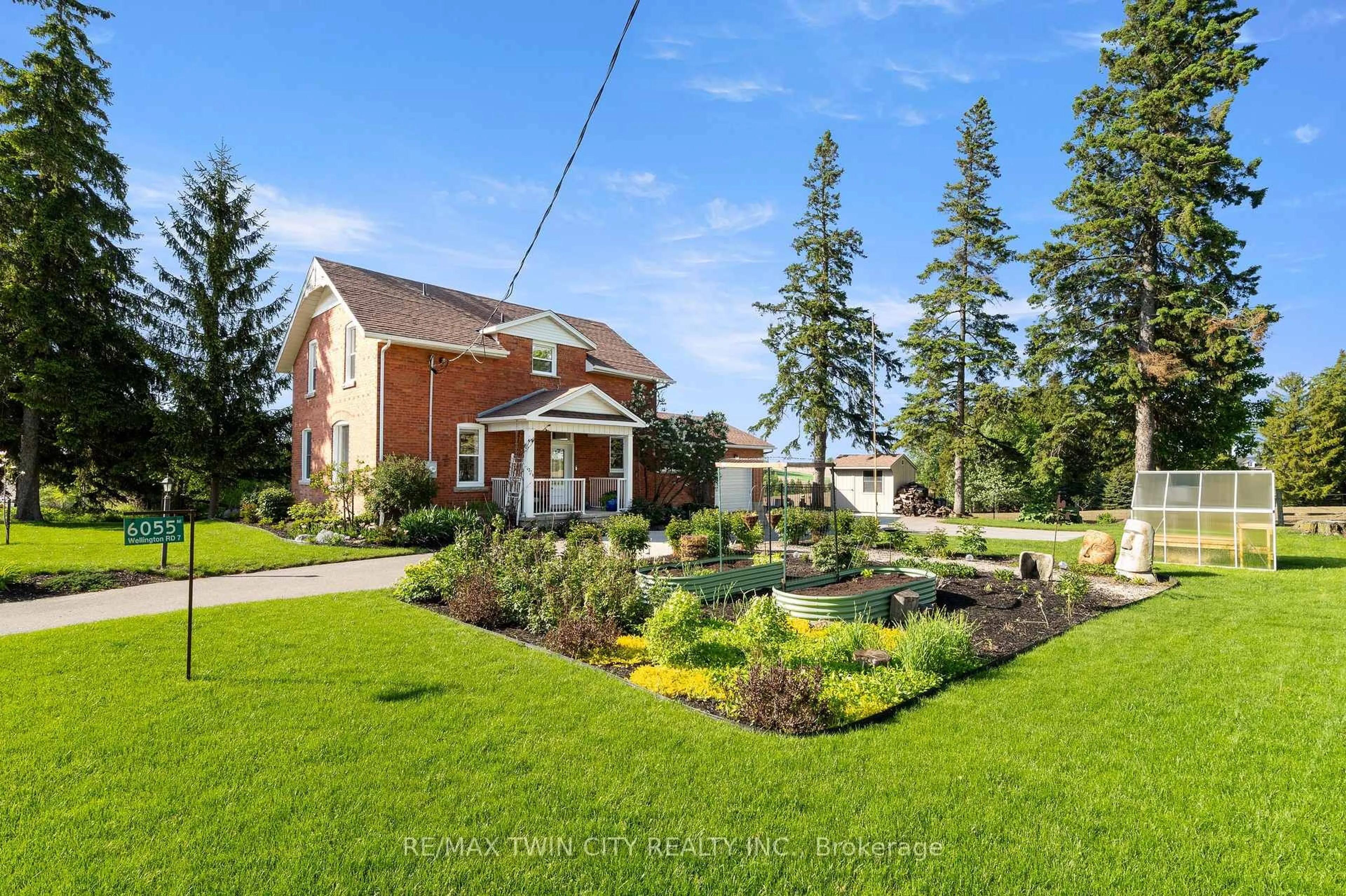 A pic from outside/outdoor area/front of a property/back of a property/a pic from drone, street for 6055 Wellington Rd 7, Centre Wellington Ontario N0B 1S0