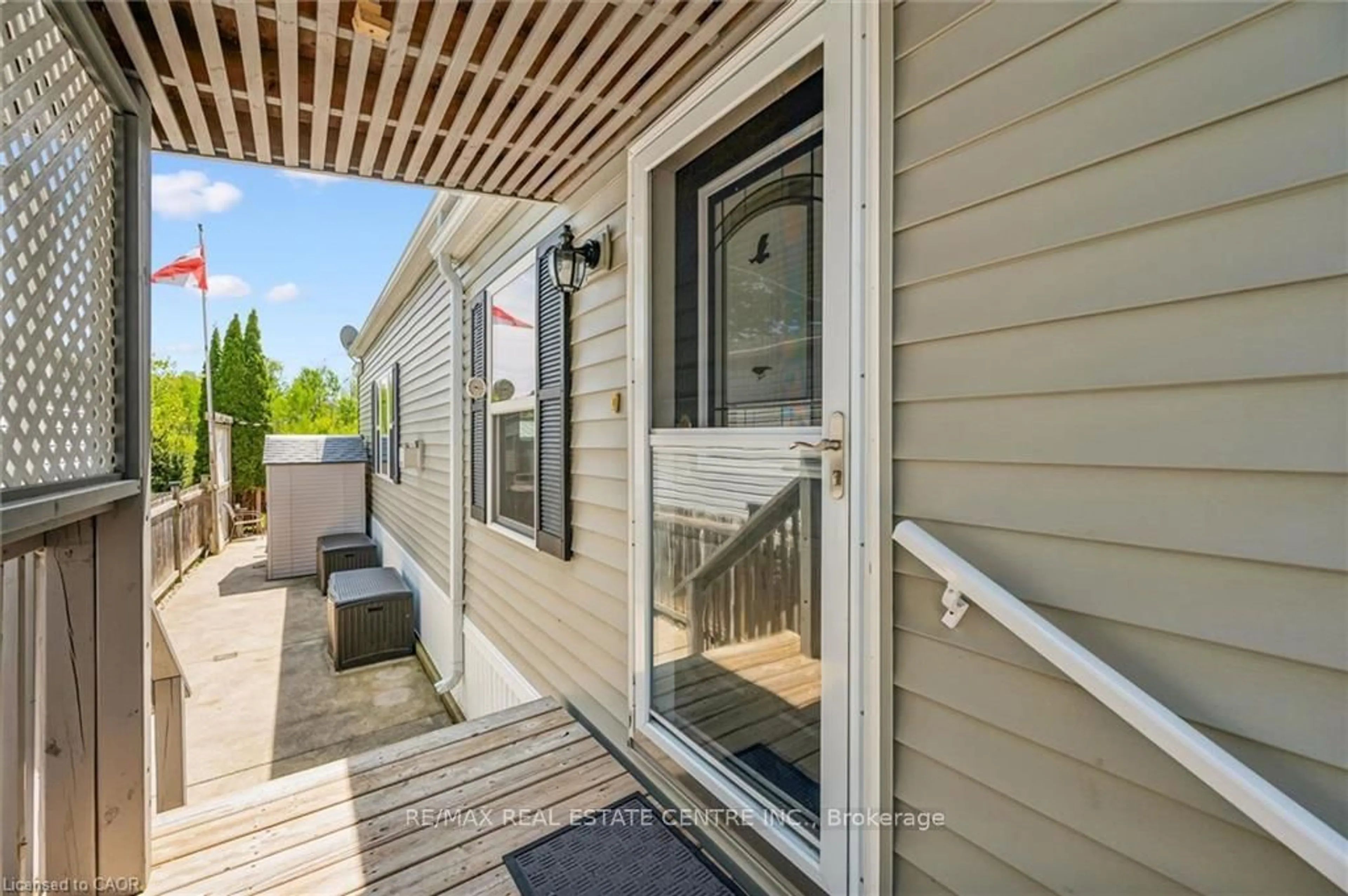 Home with vinyl exterior material, street for 56 Ash Ave, Puslinch Ontario N0B 2J0
