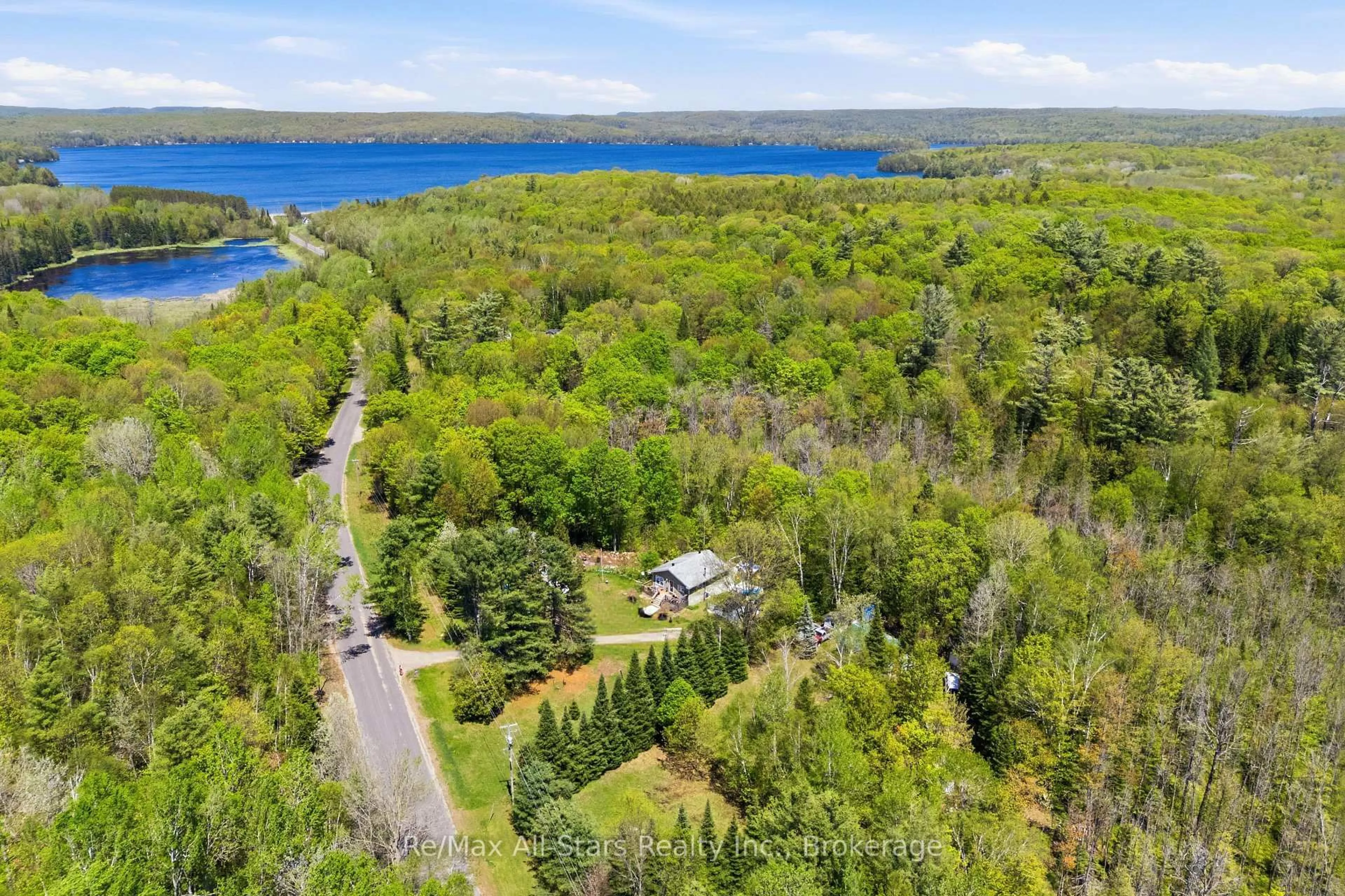 A pic from outside/outdoor area/front of a property/back of a property/a pic from drone, water/lake/river/ocean view for 2170 Buckslide Rd, Algonquin Highlands Ontario K0M 2J0