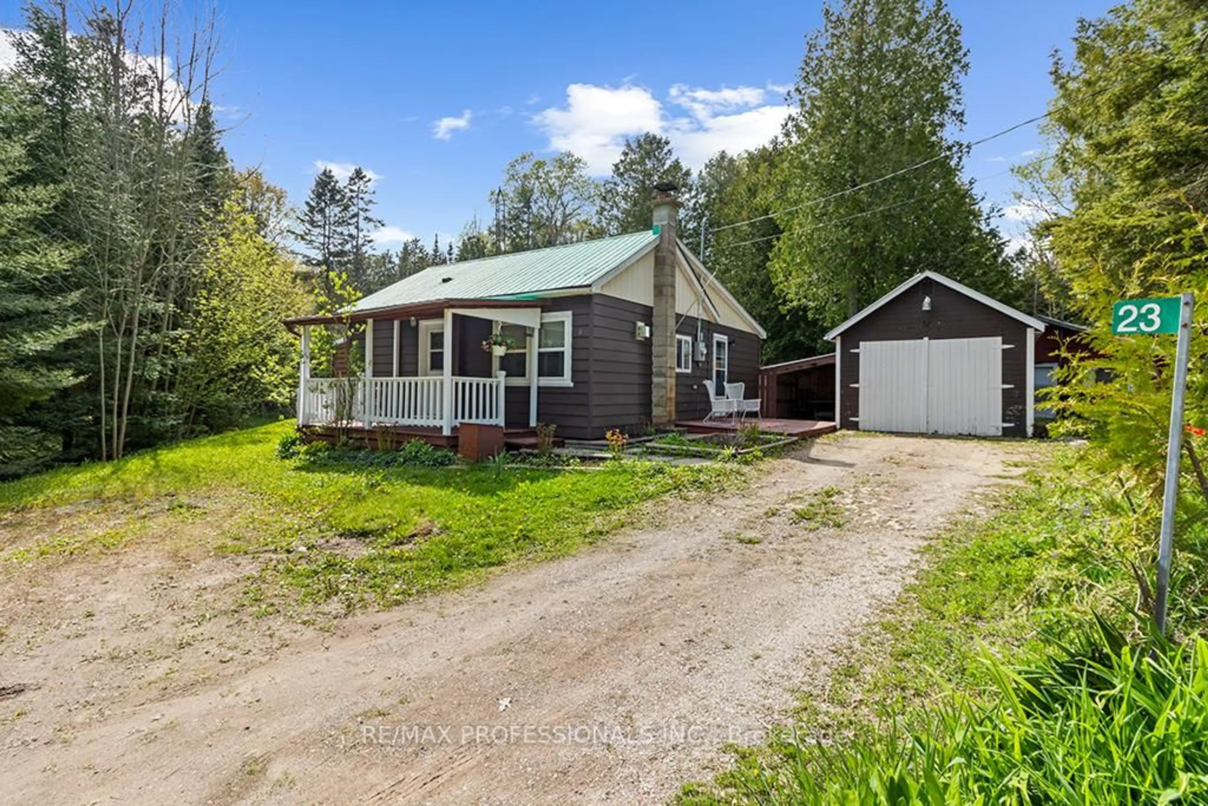 A pic from outside/outdoor area/front of a property/back of a property/a pic from drone, street for 23 Woodstock Ave, Northern Bruce Peninsula Ontario N0H 2M0