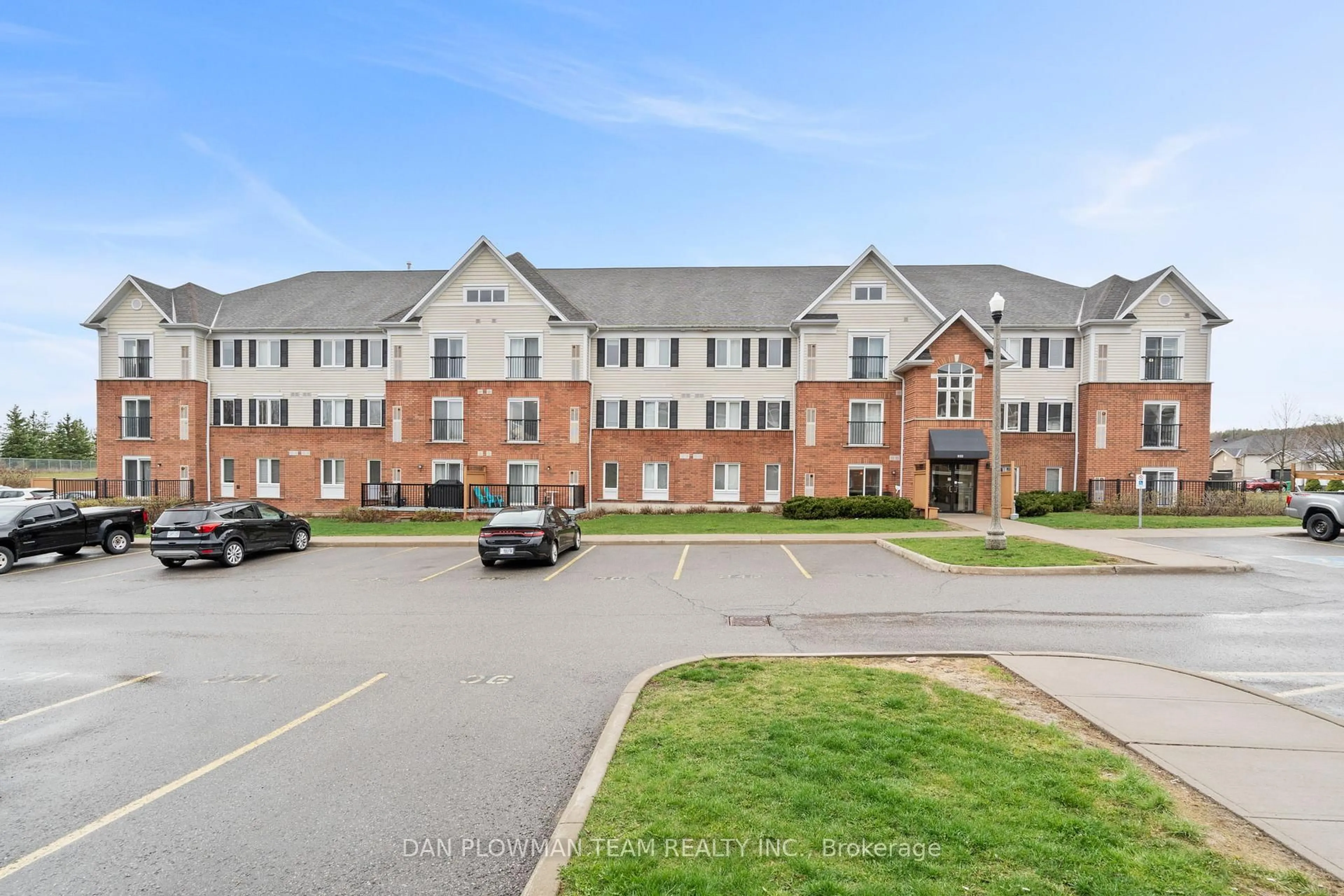 A pic from outside/outdoor area/front of a property/back of a property/a pic from drone, building for 306 Spillsbury Dr #209, Peterborough Ontario K9K 0B5